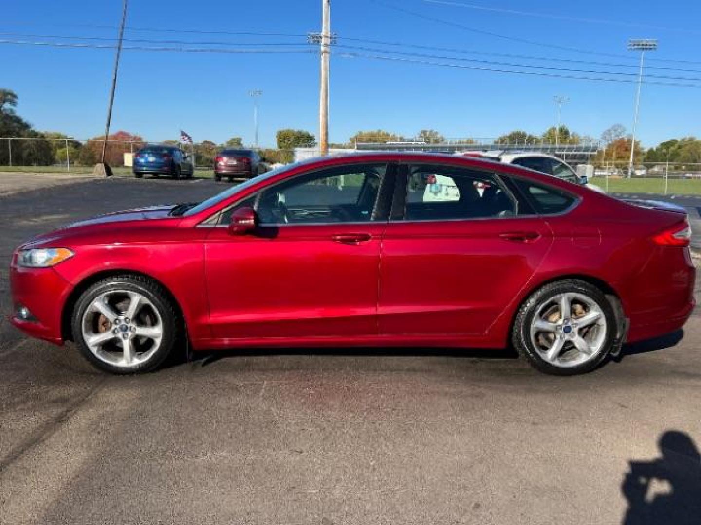 2014 Ruby Red Met Tinted CC Ford Fusion SE (3FA6P0H77ER) with an 2.5L L4 DOHC 16V engine, located at 1951 S Dayton Lakeview Rd., New Carlisle, OH, 45344, (937) 908-9800, 39.890999, -84.050255 - Photo#3