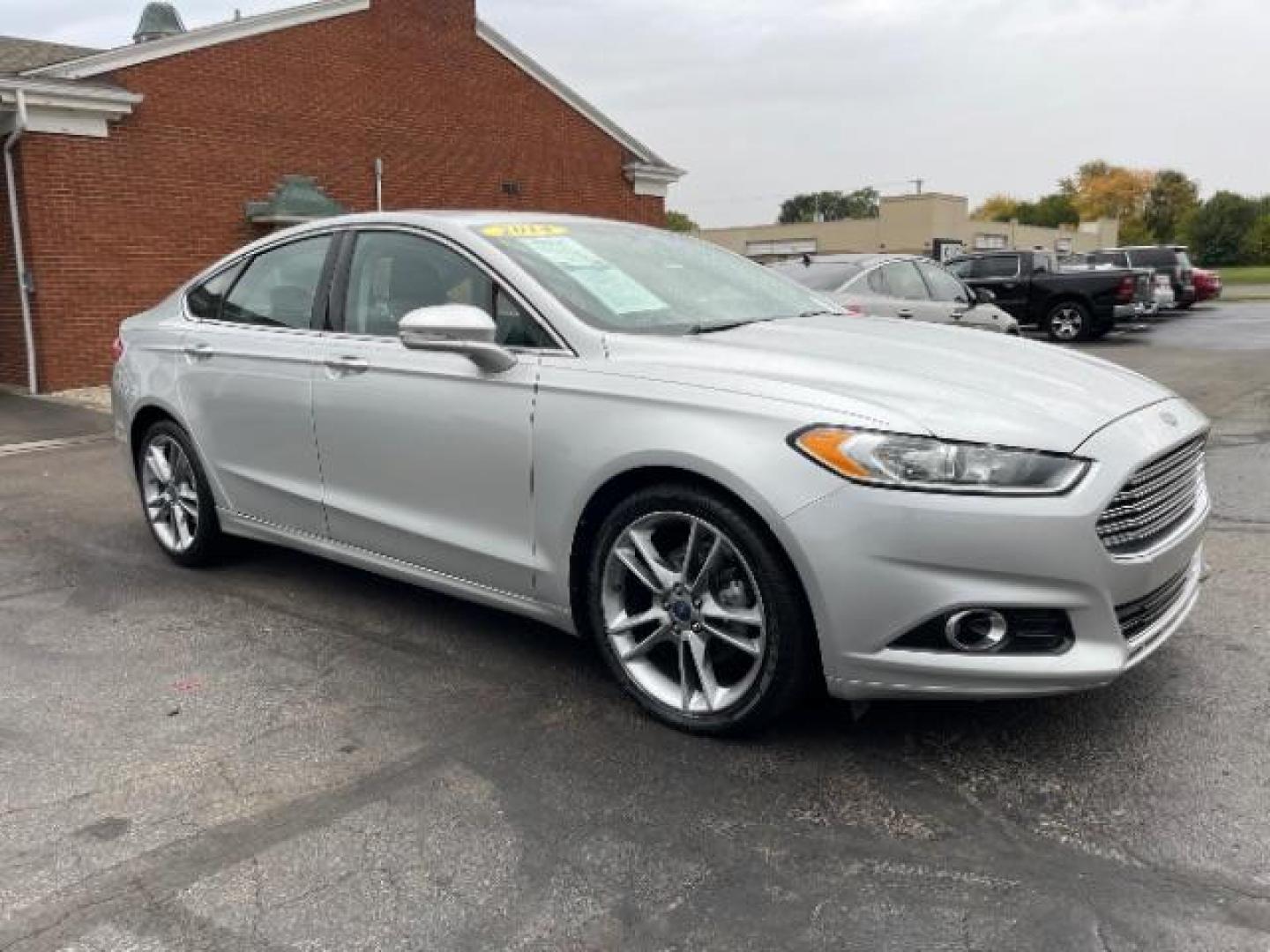 2014 Sterling Gray Ford Fusion Titanium (3FA6P0K90ER) with an 2.0L L4 DOHC 16V engine, located at 1230 East Main St, Xenia, OH, 45385, (937) 908-9800, 39.687321, -83.910294 - Photo#0