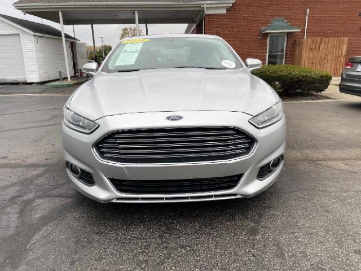 2014 Sterling Gray Ford Fusion Titanium (3FA6P0K90ER) with an 2.0L L4 DOHC 16V engine, located at 1230 East Main St, Xenia, OH, 45385, (937) 908-9800, 39.687321, -83.910294 - Photo#1