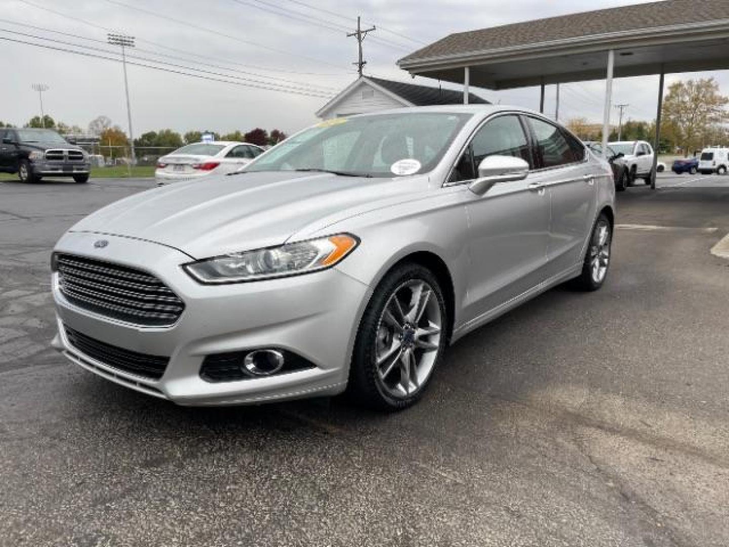 2014 Sterling Gray Ford Fusion Titanium (3FA6P0K90ER) with an 2.0L L4 DOHC 16V engine, located at 1230 East Main St, Xenia, OH, 45385, (937) 908-9800, 39.687321, -83.910294 - Photo#2