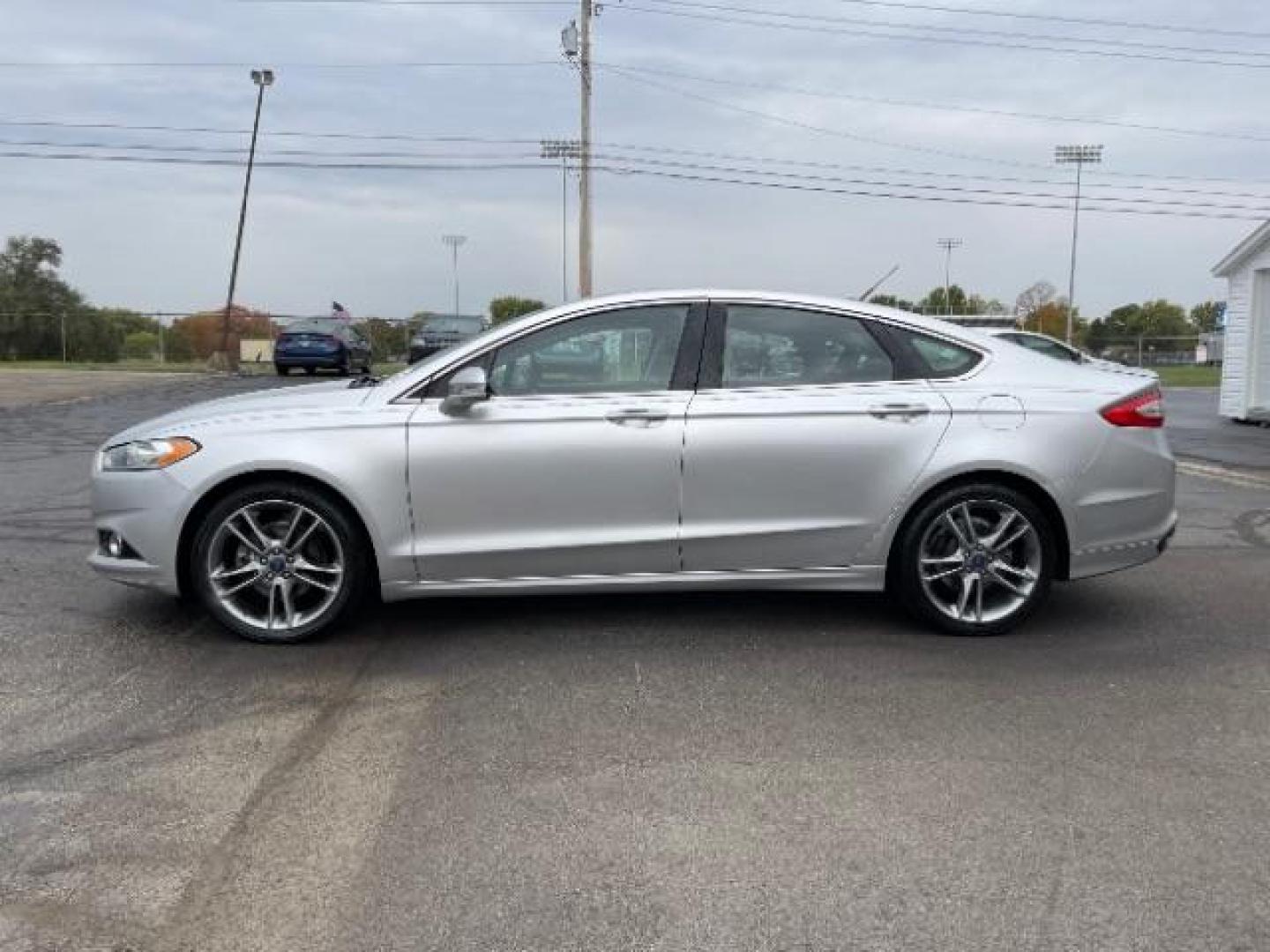 2014 Sterling Gray Ford Fusion Titanium (3FA6P0K90ER) with an 2.0L L4 DOHC 16V engine, located at 1230 East Main St, Xenia, OH, 45385, (937) 908-9800, 39.687321, -83.910294 - Photo#3