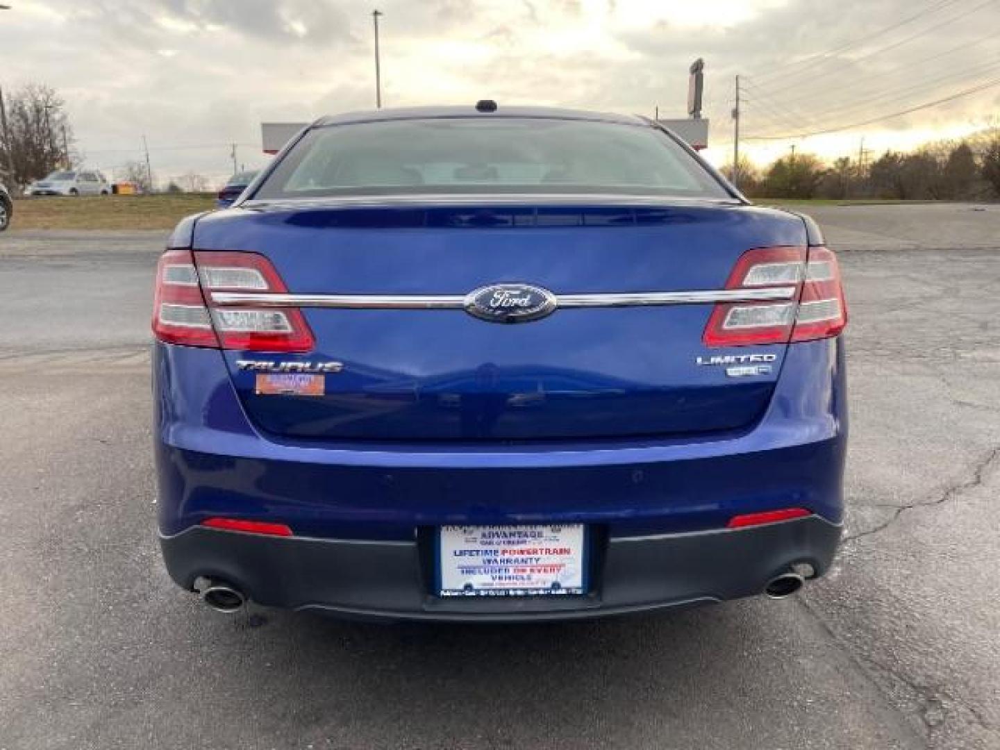 2014 Deep Impact Blue Metallic Ford Taurus Limited AWD (1FAHP2J86EG) with an 3.5L V6 DOHC 24V engine, 6-Speed Automatic transmission, located at 1230 East Main St, Xenia, OH, 45385, (937) 908-9800, 39.687321, -83.910294 - Photo#3