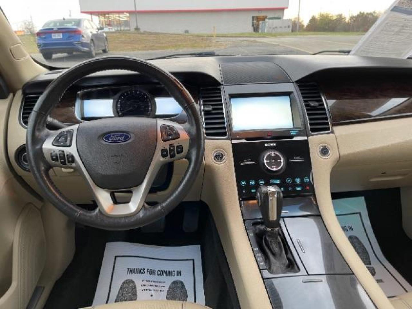 2014 Deep Impact Blue Metallic Ford Taurus Limited AWD (1FAHP2J86EG) with an 3.5L V6 DOHC 24V engine, 6-Speed Automatic transmission, located at 1230 East Main St, Xenia, OH, 45385, (937) 908-9800, 39.687321, -83.910294 - Photo#7