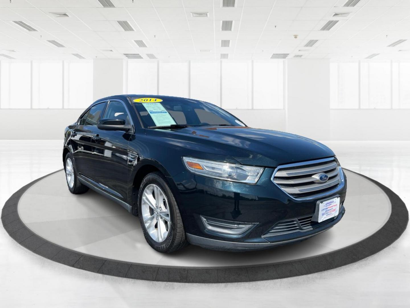 2014 Sterling Gray Metallic Ford Taurus (1FAHP2E80EG) with an 3.5L V6 DOHC 24V engine, 6-Speed Automatic transmission, located at 1230 East Main St, Xenia, OH, 45385, (937) 908-9800, 39.687321, -83.910294 - Photo#0