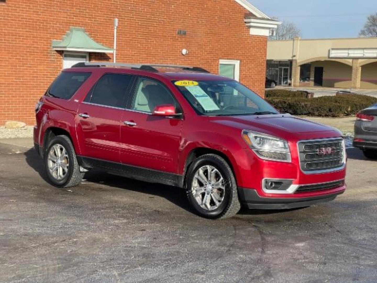 2014 Crystal Red Tintcoat GMC Acadia SLT-1 FWD (1GKKRRKDXEJ) with an 3.6L V6 DOHC 24V engine, 6-Speed Automatic transmission, located at 1099 N County Rd 25A, OH, 45373, (937) 908-9800, 40.057079, -84.212883 - Photo#0