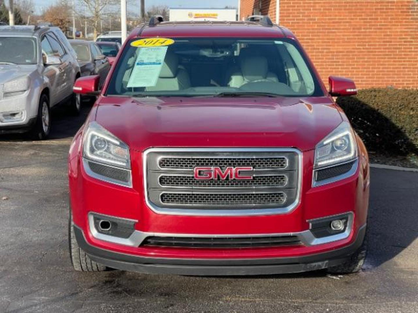 2014 Crystal Red Tintcoat GMC Acadia SLT-1 FWD (1GKKRRKDXEJ) with an 3.6L V6 DOHC 24V engine, 6-Speed Automatic transmission, located at 1099 N County Rd 25A, OH, 45373, (937) 908-9800, 40.057079, -84.212883 - Photo#4