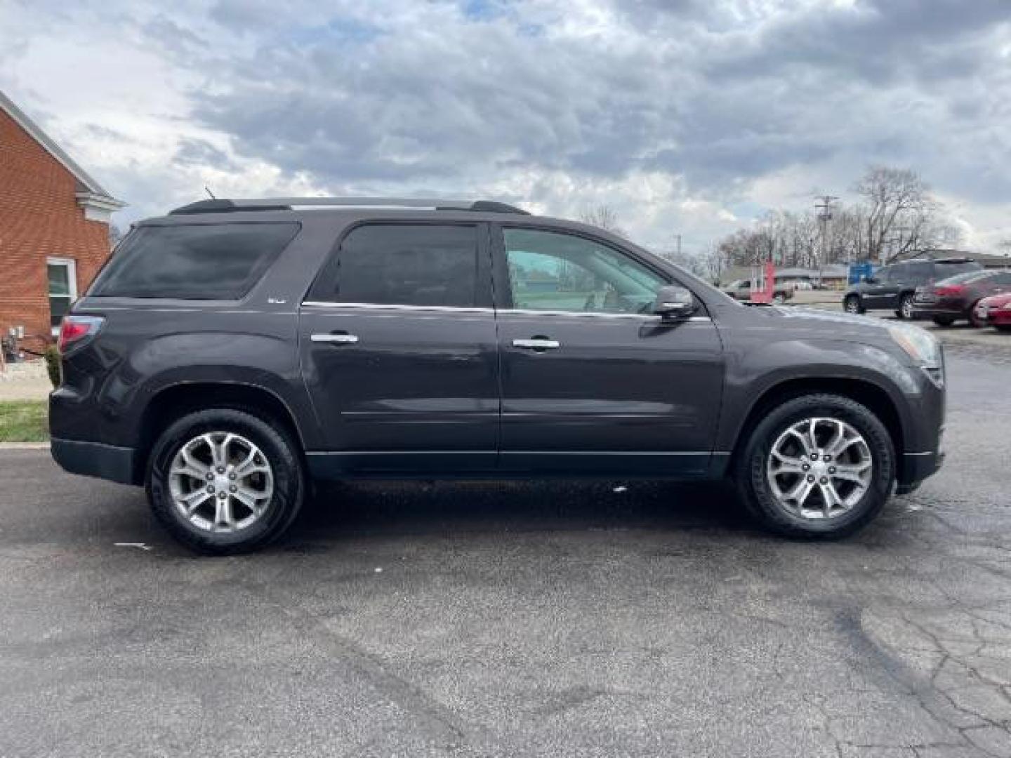 2014 Cyber Gray Metallic GMC Acadia SLT-1 FWD (1GKKRRKD1EJ) with an 3.6L V6 DOHC 24V engine, 6-Speed Automatic transmission, located at 1099 N County Rd 25A, OH, 45373, (937) 908-9800, 40.057079, -84.212883 - Photo#2