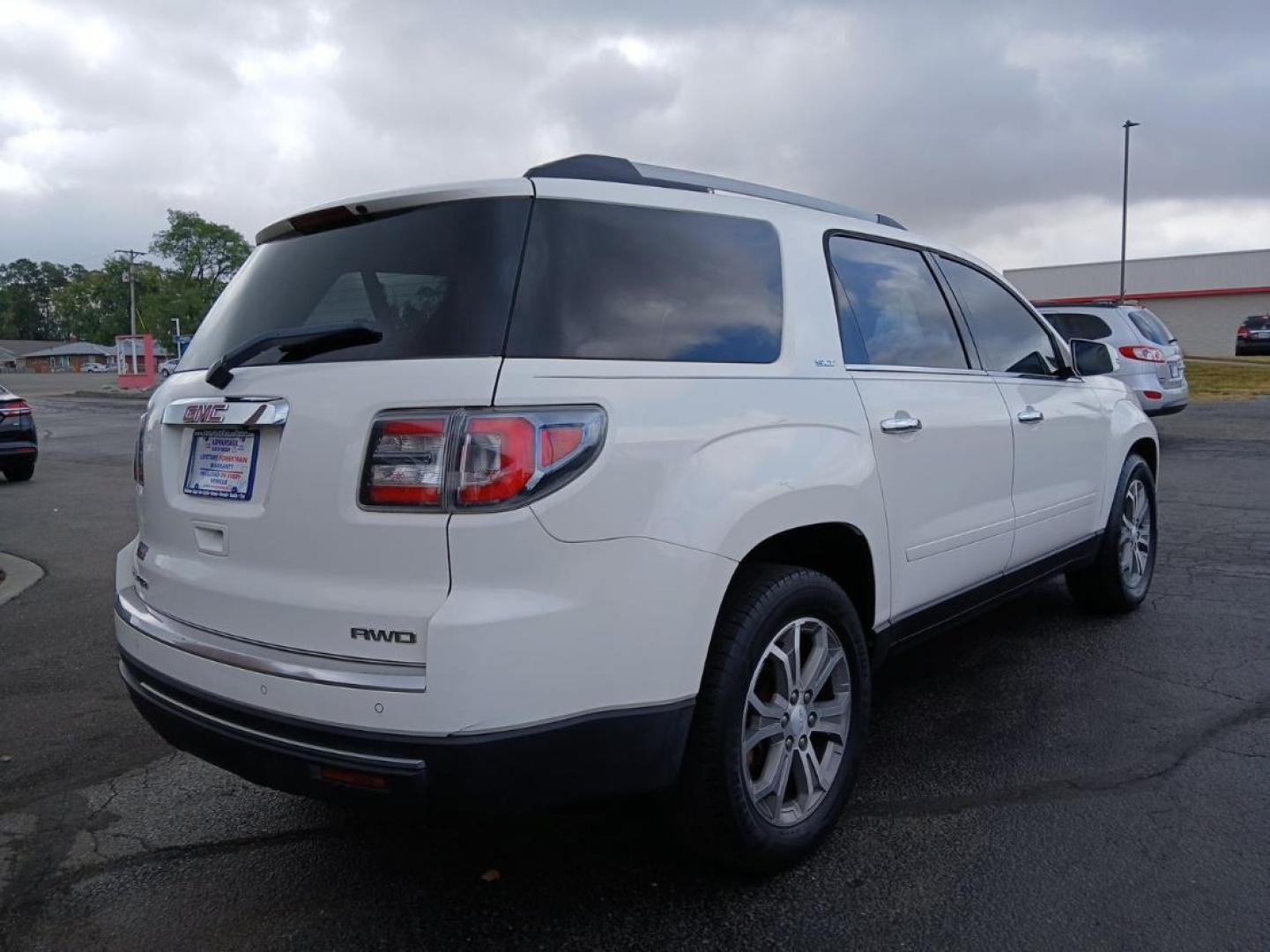 2014 Summit White GMC Acadia SLT-1 AWD (1GKKVRKD8EJ) with an 3.6L V6 DOHC 24V engine, 6-Speed Automatic transmission, located at 1099 N County Rd 25A, OH, 45373, (937) 908-9800, 40.057079, -84.212883 - Photo#1