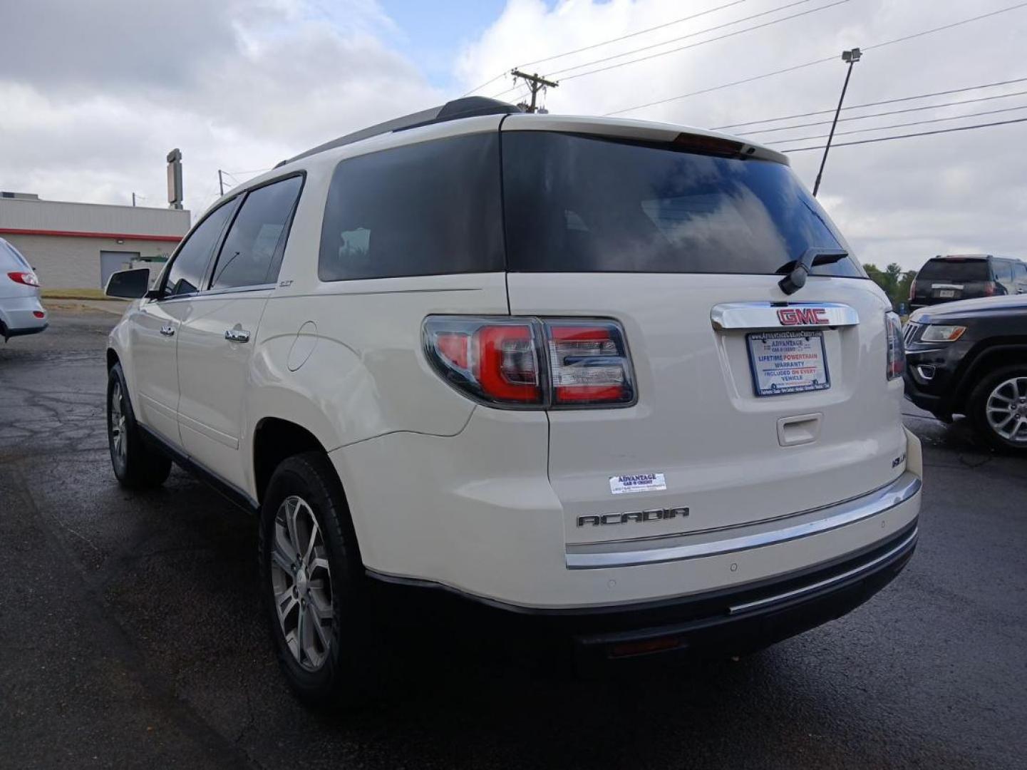 2014 Summit White GMC Acadia SLT-1 AWD (1GKKVRKD8EJ) with an 3.6L V6 DOHC 24V engine, 6-Speed Automatic transmission, located at 1099 N County Rd 25A, OH, 45373, (937) 908-9800, 40.057079, -84.212883 - Photo#3