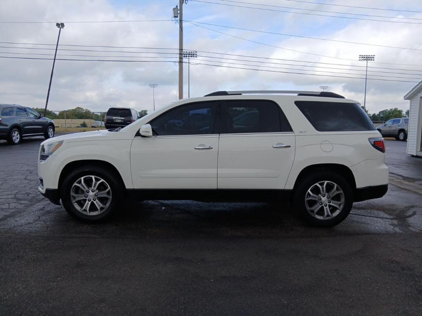 2014 Summit White GMC Acadia SLT-1 AWD (1GKKVRKD8EJ) with an 3.6L V6 DOHC 24V engine, 6-Speed Automatic transmission, located at 1099 N County Rd 25A, OH, 45373, (937) 908-9800, 40.057079, -84.212883 - Photo#4