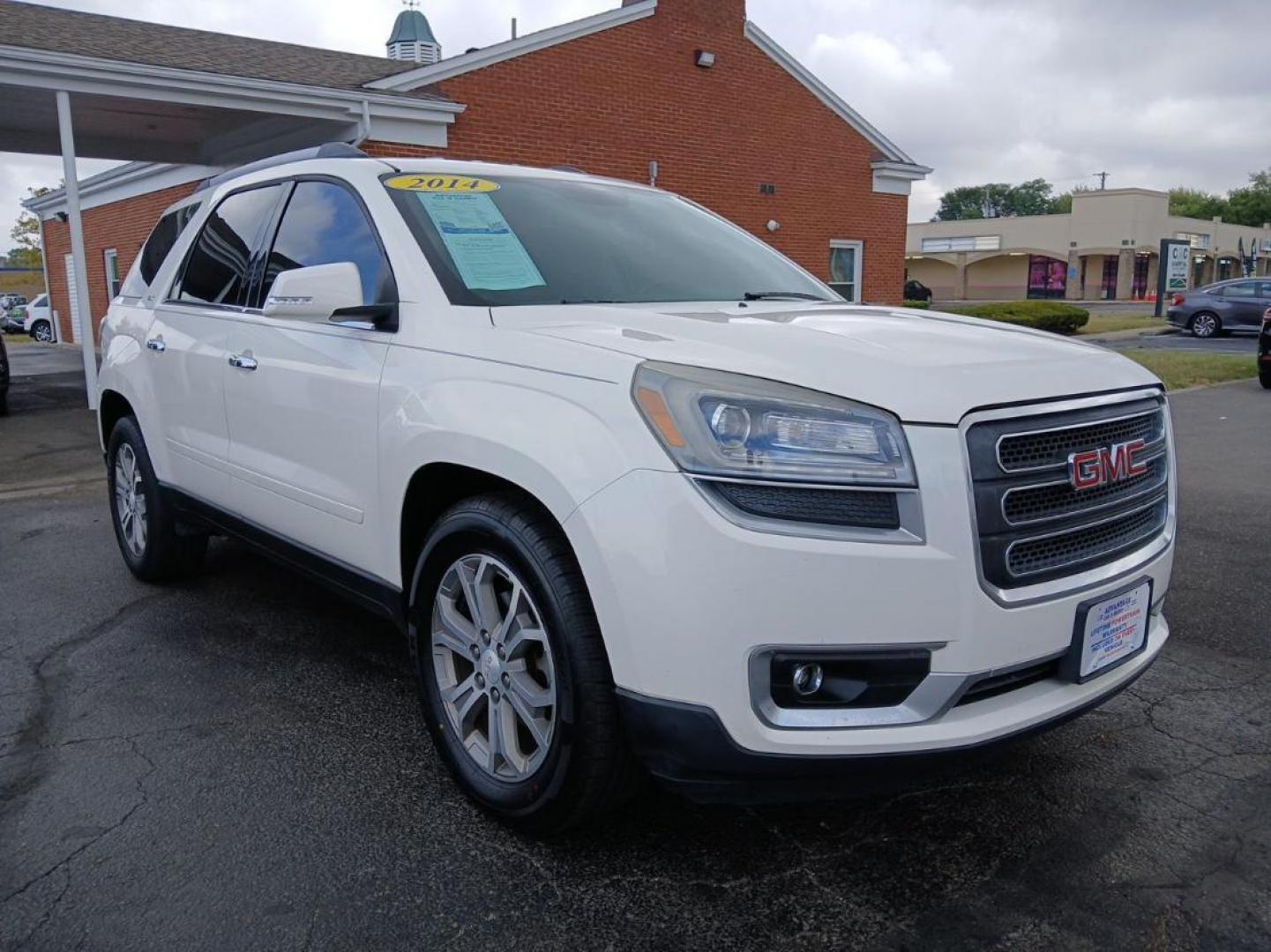 2014 Summit White GMC Acadia SLT-1 AWD (1GKKVRKD8EJ) with an 3.6L V6 DOHC 24V engine, 6-Speed Automatic transmission, located at 1099 N County Rd 25A, OH, 45373, (937) 908-9800, 40.057079, -84.212883 - Photo#7