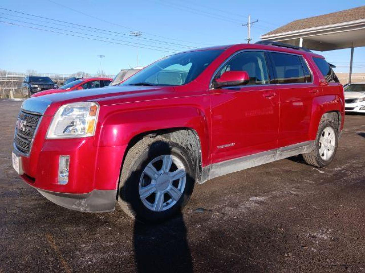 2014 Crystal Red Tintcoat GMC Terrain SLE2 FWD (2GKALREK7E6) with an 2.4L L4 DOHC 16V FFV engine, 6-Speed Automatic transmission, located at 1099 N County Rd 25A, OH, 45373, (937) 908-9800, 40.057079, -84.212883 - Photo#2