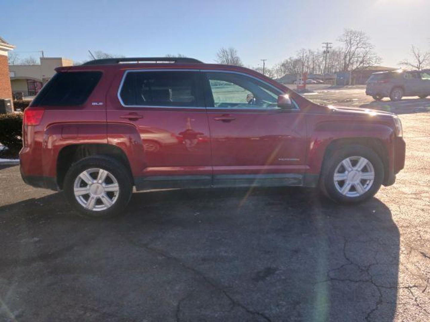 2014 Crystal Red Tintcoat GMC Terrain SLE2 FWD (2GKALREK7E6) with an 2.4L L4 DOHC 16V FFV engine, 6-Speed Automatic transmission, located at 1099 N County Rd 25A, OH, 45373, (937) 908-9800, 40.057079, -84.212883 - Photo#4