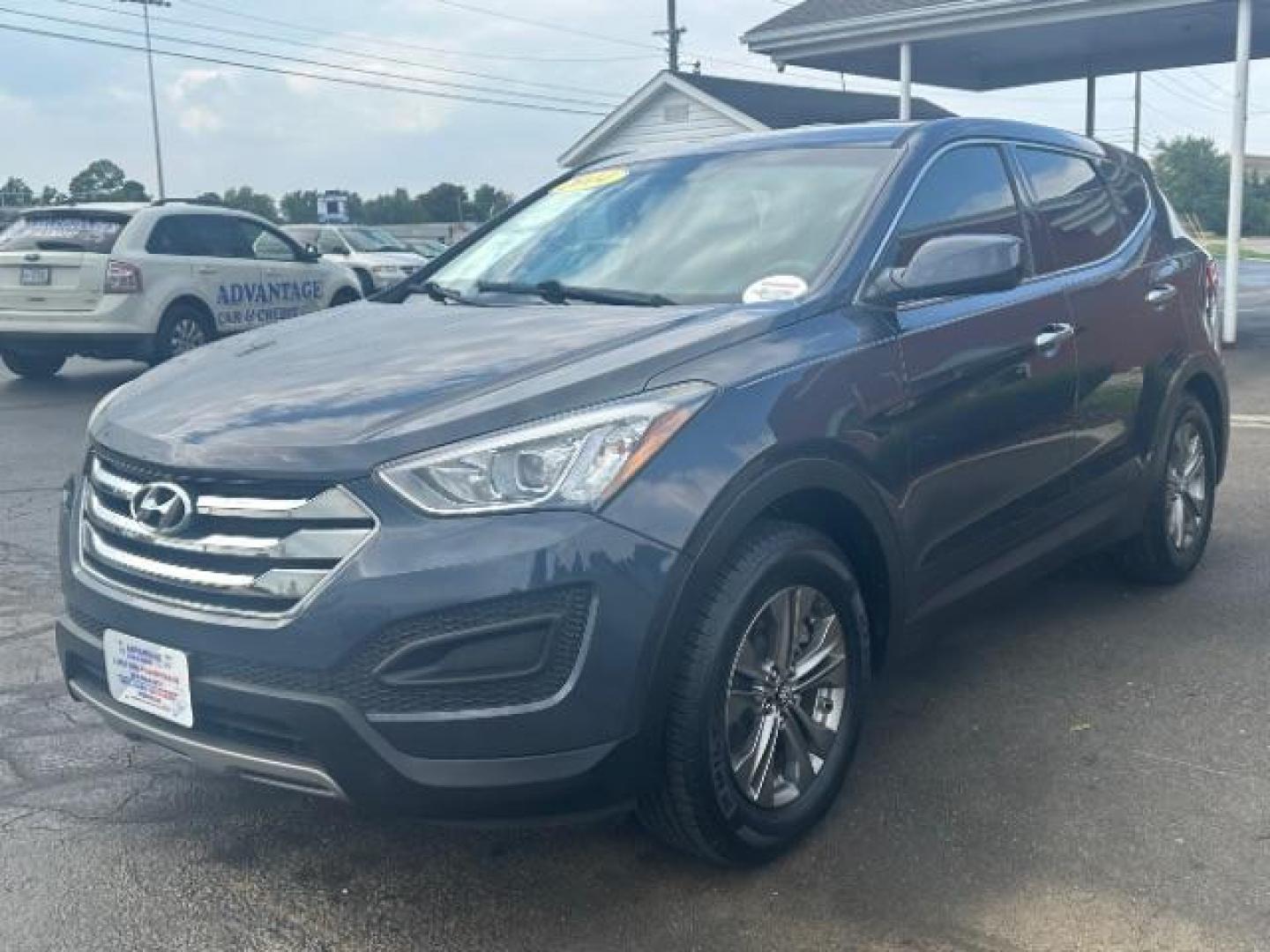 2014 Marlin Blue Hyundai Santa Fe Sport 2.4 FWD (5XYZT3LB3EG) with an 2.4L L4 DOHC 16V engine, 6-Speed Automatic transmission, located at 1230 East Main St, Xenia, OH, 45385, (937) 908-9800, 39.687321, -83.910294 - Photo#2