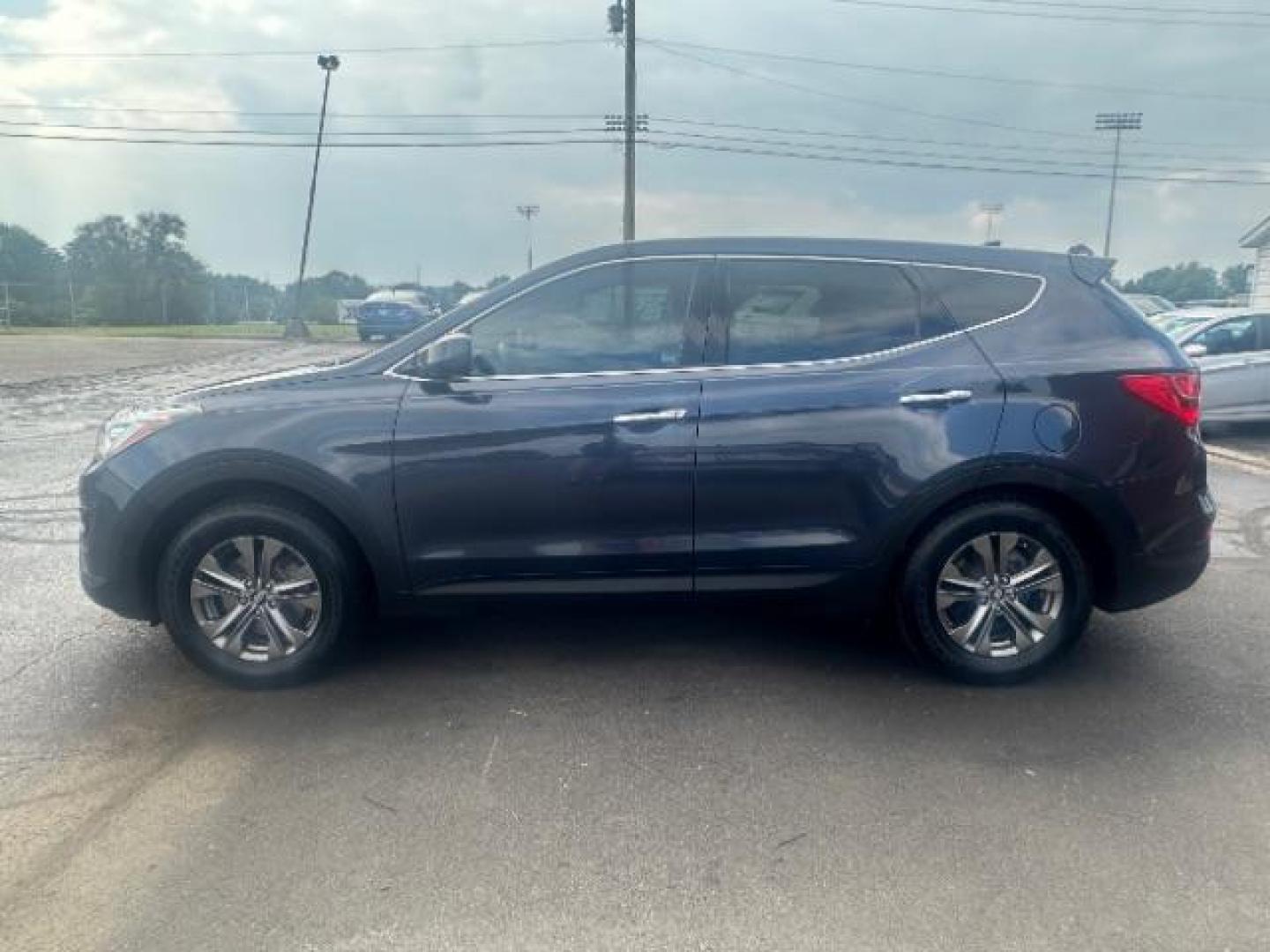 2014 Marlin Blue Hyundai Santa Fe Sport 2.4 FWD (5XYZT3LB3EG) with an 2.4L L4 DOHC 16V engine, 6-Speed Automatic transmission, located at 1230 East Main St, Xenia, OH, 45385, (937) 908-9800, 39.687321, -83.910294 - Photo#3