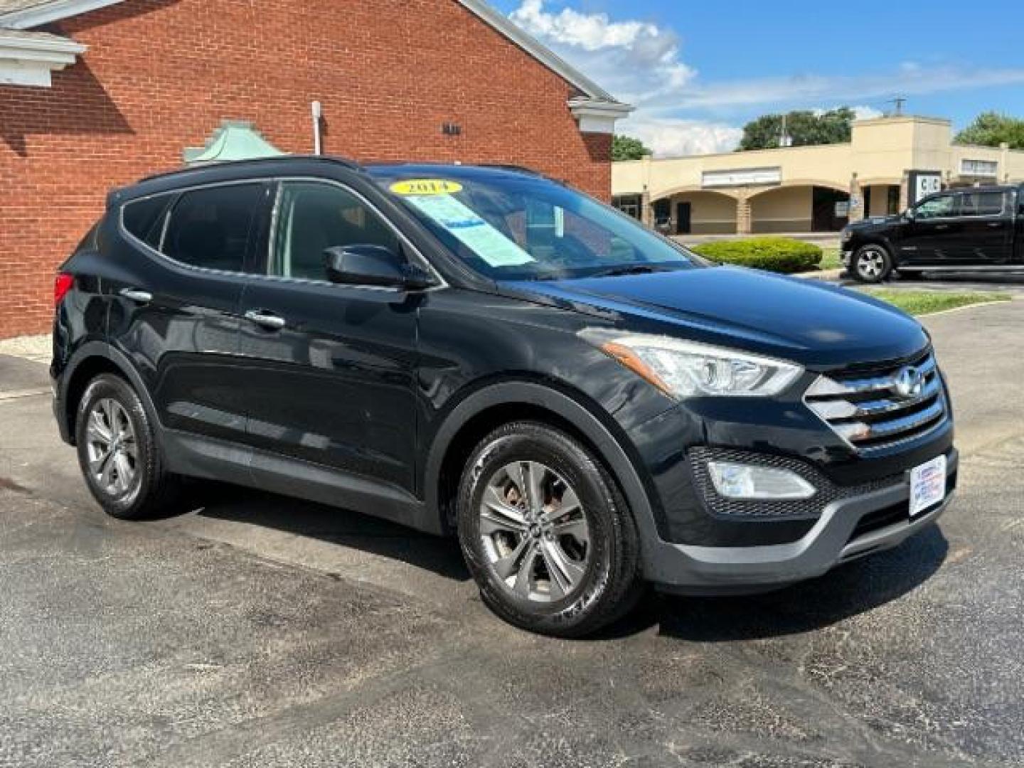 2014 Twilight Black Hyundai Santa Fe Sport 2.4 FWD (5XYZU3LB4EG) with an 2.4L L4 DOHC 16V engine, 6-Speed Automatic transmission, located at 401 Woodman Dr, Riverside, OH, 45431, (937) 908-9800, 39.763779, -84.122063 - Photo#0