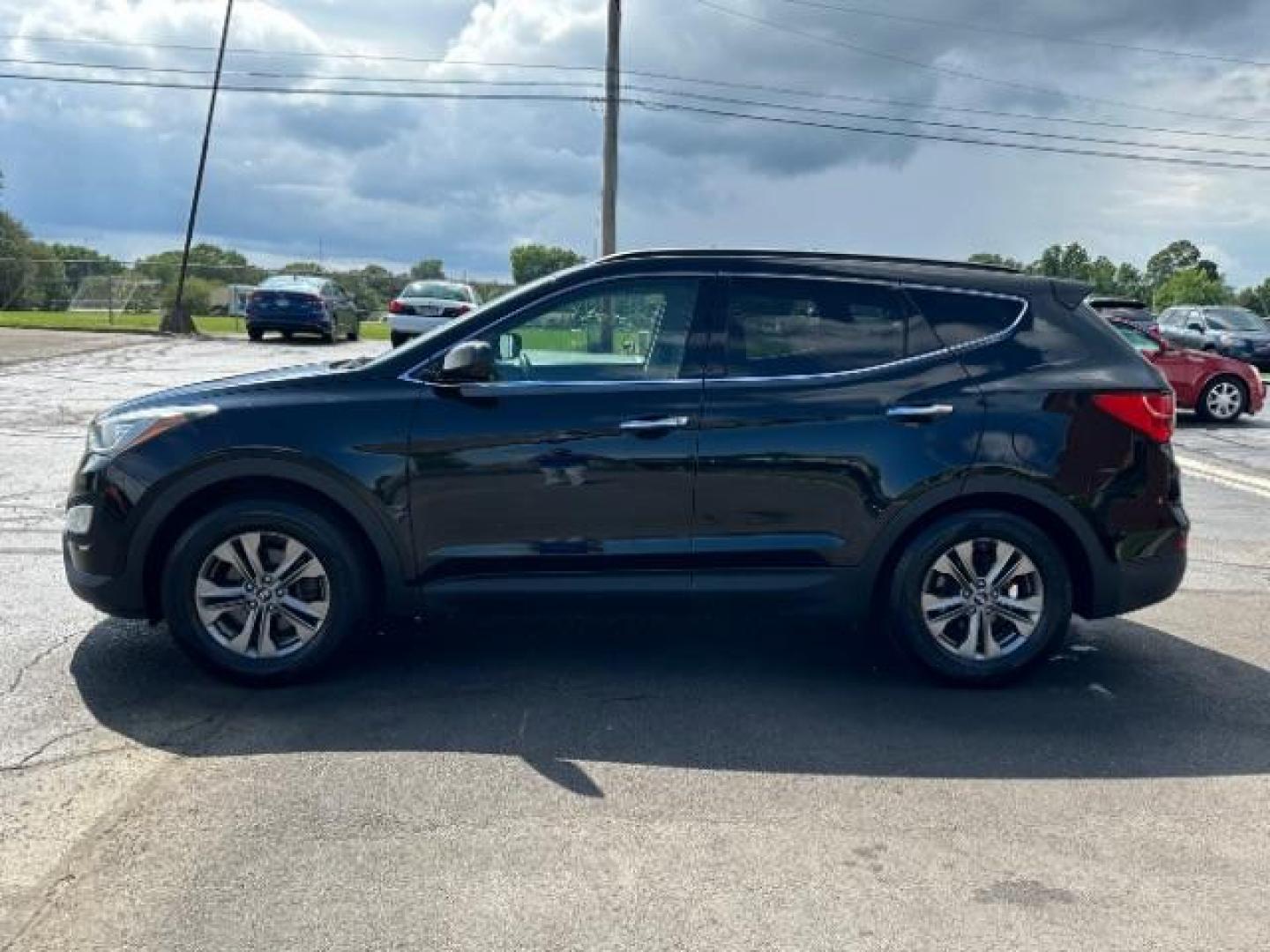 2014 Twilight Black Hyundai Santa Fe Sport 2.4 FWD (5XYZU3LB4EG) with an 2.4L L4 DOHC 16V engine, 6-Speed Automatic transmission, located at 401 Woodman Dr, Riverside, OH, 45431, (937) 908-9800, 39.763779, -84.122063 - Photo#3