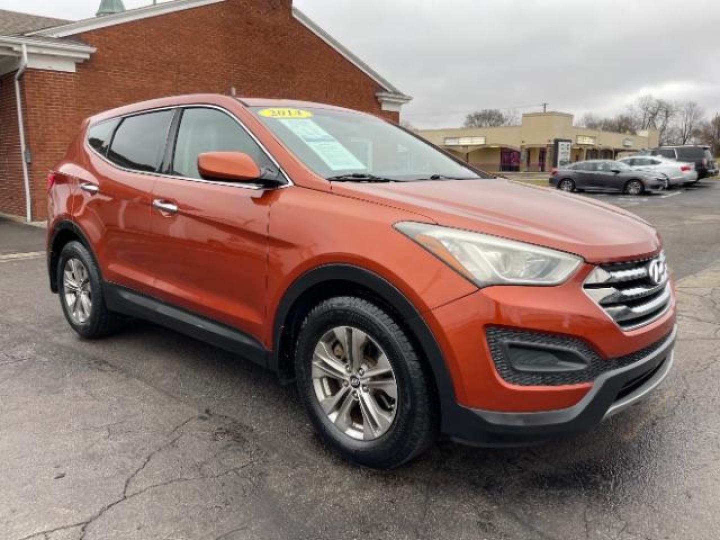 2014 Canyon Copper Hyundai Santa Fe Sport 2.4 FWD (5XYZT3LB1EG) with an 2.4L L4 DOHC 16V engine, 6-Speed Automatic transmission, located at 1951 S Dayton Lakeview Rd., New Carlisle, OH, 45344, (937) 908-9800, 39.890999, -84.050255 - Photo#0