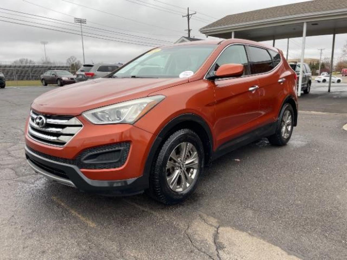 2014 Canyon Copper Hyundai Santa Fe Sport 2.4 FWD (5XYZT3LB1EG) with an 2.4L L4 DOHC 16V engine, 6-Speed Automatic transmission, located at 1951 S Dayton Lakeview Rd., New Carlisle, OH, 45344, (937) 908-9800, 39.890999, -84.050255 - Photo#1