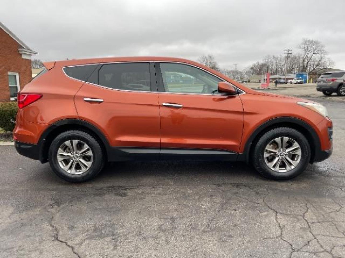 2014 Canyon Copper Hyundai Santa Fe Sport 2.4 FWD (5XYZT3LB1EG) with an 2.4L L4 DOHC 16V engine, 6-Speed Automatic transmission, located at 1951 S Dayton Lakeview Rd., New Carlisle, OH, 45344, (937) 908-9800, 39.890999, -84.050255 - Photo#3