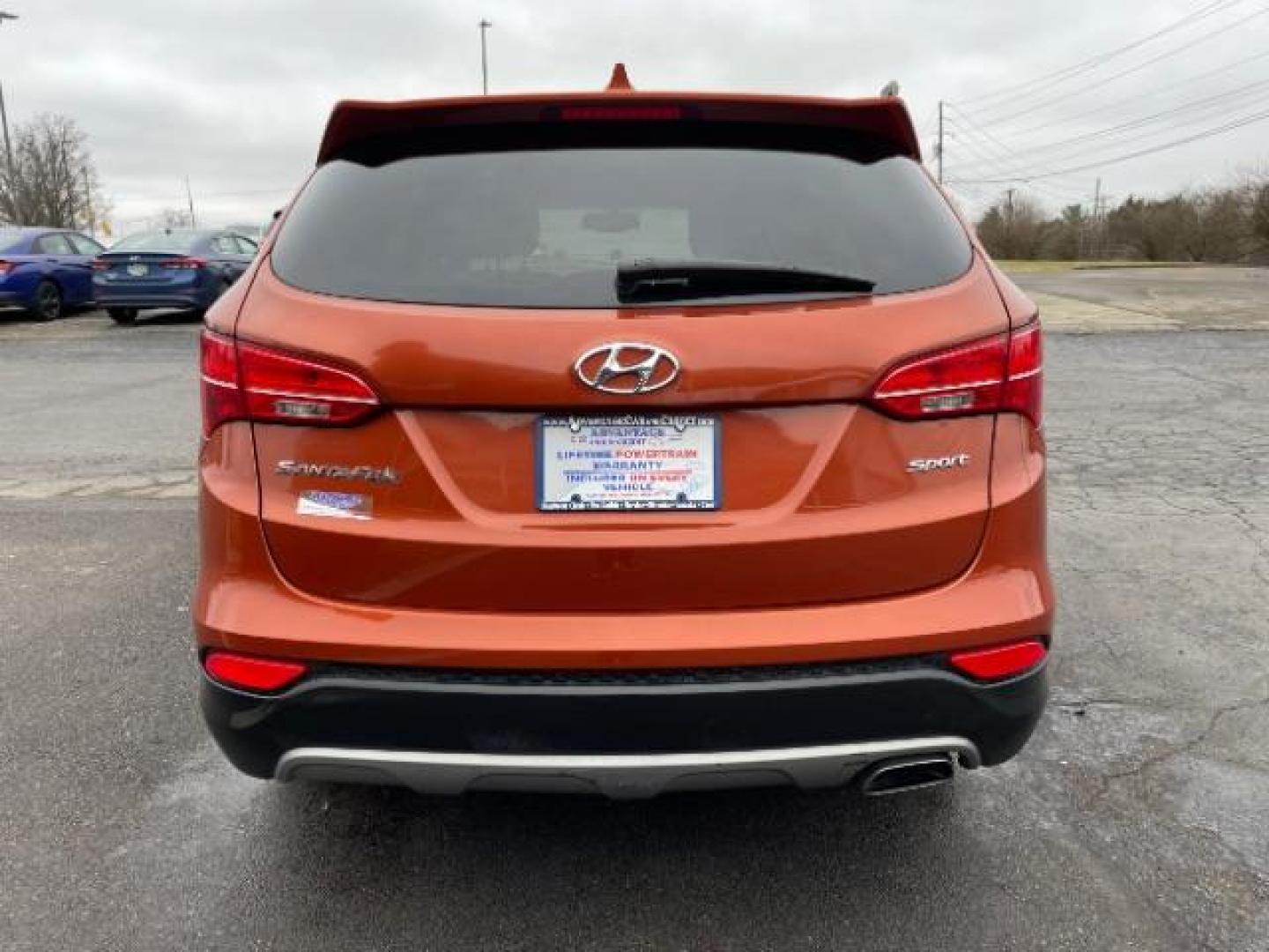 2014 Canyon Copper Hyundai Santa Fe Sport 2.4 FWD (5XYZT3LB1EG) with an 2.4L L4 DOHC 16V engine, 6-Speed Automatic transmission, located at 1951 S Dayton Lakeview Rd., New Carlisle, OH, 45344, (937) 908-9800, 39.890999, -84.050255 - Photo#4