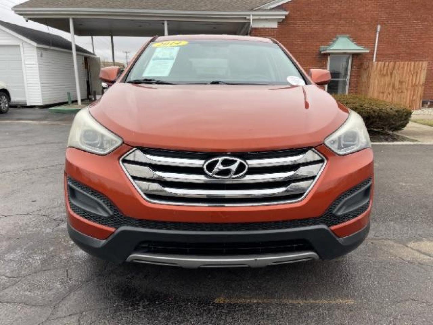 2014 Canyon Copper Hyundai Santa Fe Sport 2.4 FWD (5XYZT3LB1EG) with an 2.4L L4 DOHC 16V engine, 6-Speed Automatic transmission, located at 1951 S Dayton Lakeview Rd., New Carlisle, OH, 45344, (937) 908-9800, 39.890999, -84.050255 - Photo#5