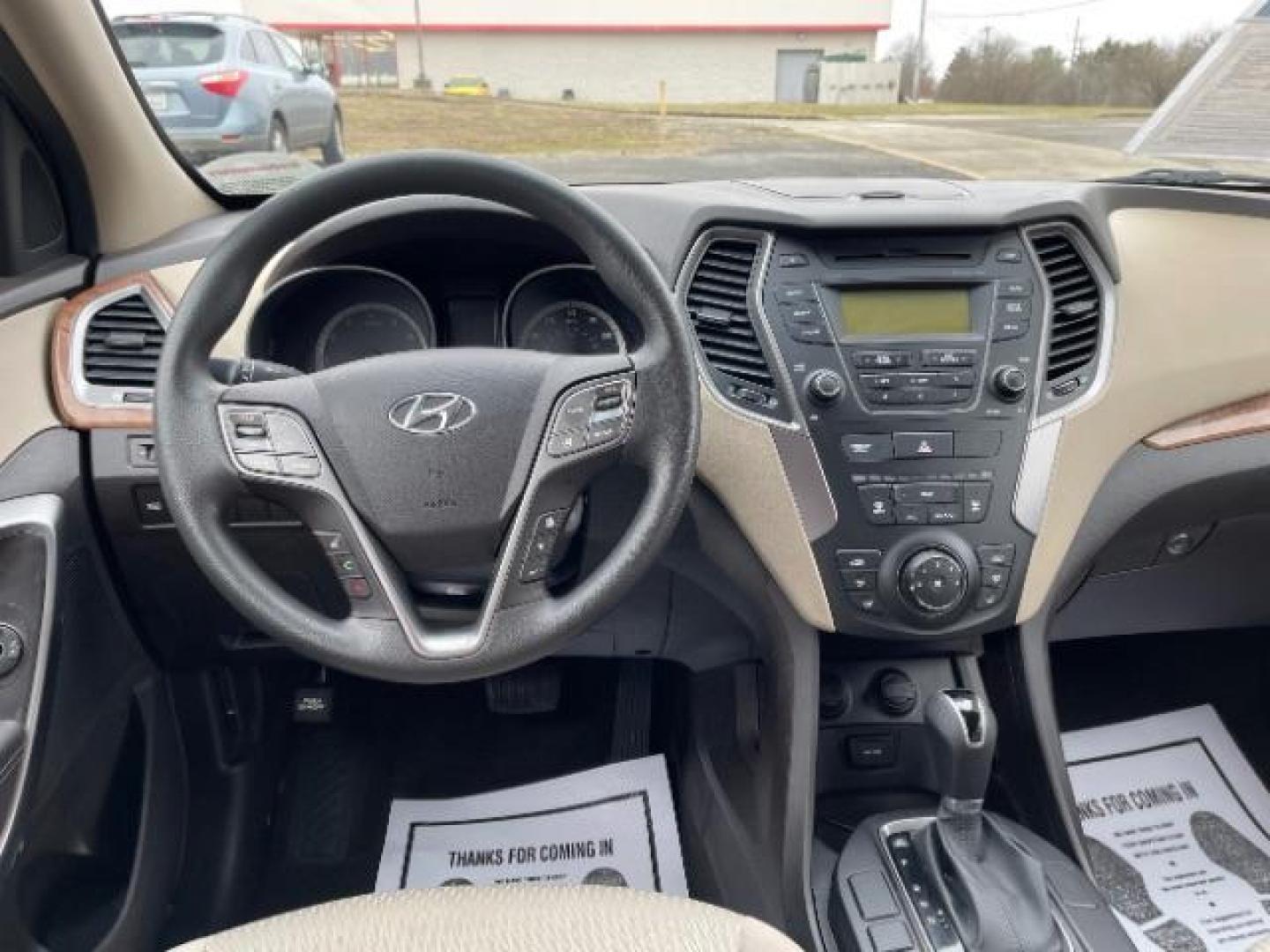 2014 Canyon Copper Hyundai Santa Fe Sport 2.4 FWD (5XYZT3LB1EG) with an 2.4L L4 DOHC 16V engine, 6-Speed Automatic transmission, located at 1951 S Dayton Lakeview Rd., New Carlisle, OH, 45344, (937) 908-9800, 39.890999, -84.050255 - Photo#7