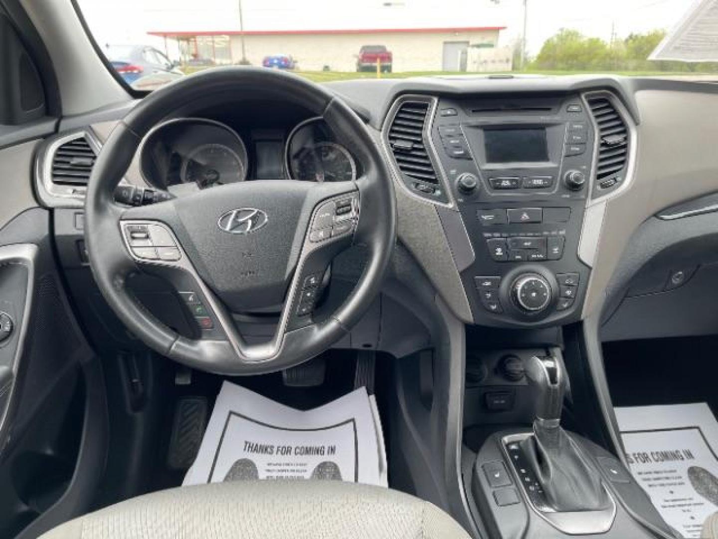 2014 Mineral Gray Hyundai Santa Fe Sport 2.4 FWD (5XYZU3LB3EG) with an 2.4L L4 DOHC 16V engine, 6-Speed Automatic transmission, located at 1099 N County Rd 25A, OH, 45373, (937) 908-9800, 40.057079, -84.212883 - Photo#7