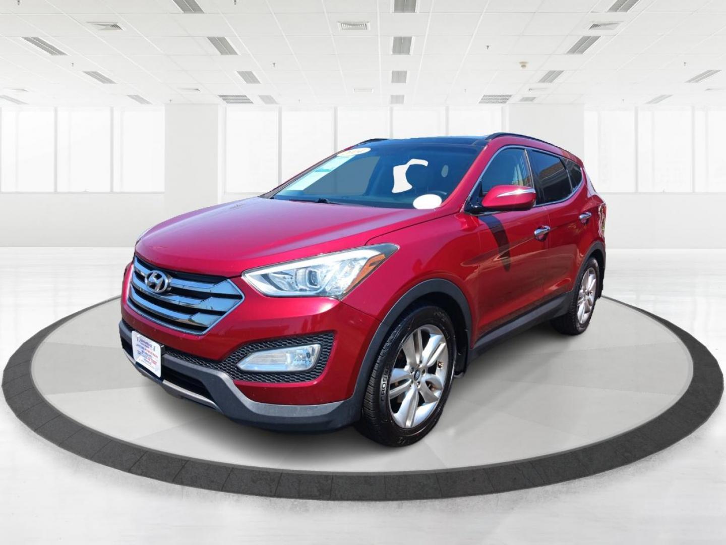 2014 Serrano Red Hyundai Santa Fe Sport 2.0T FWD (5XYZW3LA0EG) with an 2.0L L4 DOHC 16V TURBO engine, 6-Speed Automatic transmission, located at 1184 Kauffman Ave, Fairborn, OH, 45324, (937) 908-9800, 39.807365, -84.029114 - Photo#7