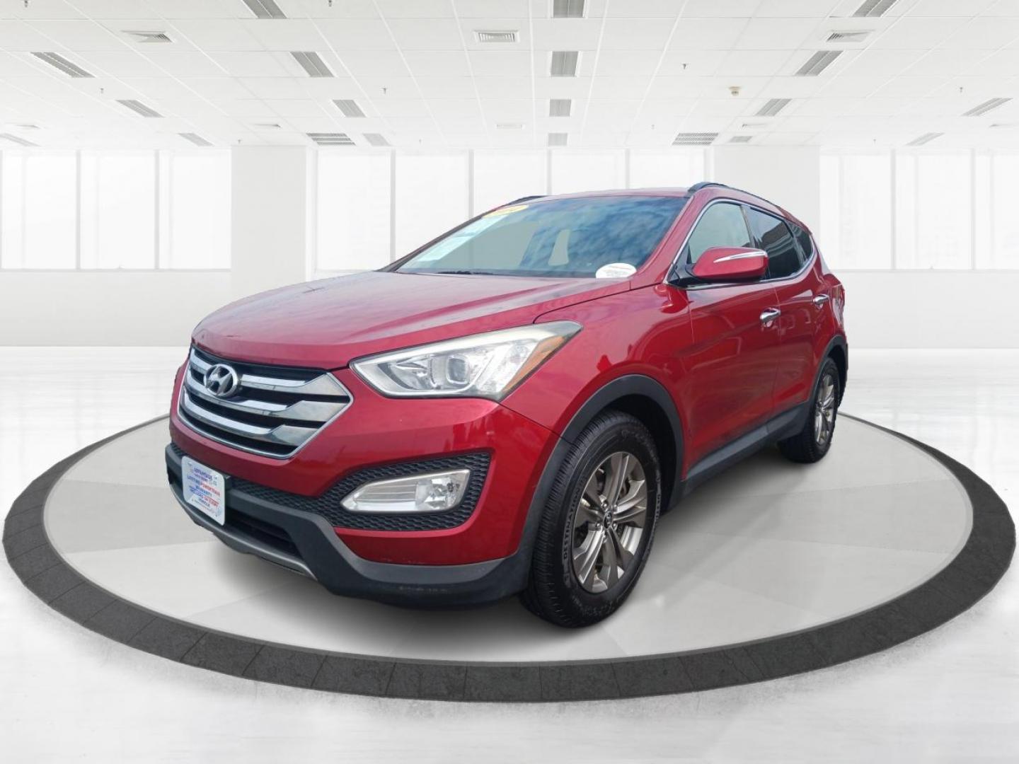 2014 Serrano Red Hyundai Santa Fe Sport 2.4 FWD (5XYZU3LB6EG) with an 2.4L L4 DOHC 16V engine, 6-Speed Automatic transmission, located at 1230 East Main St, Xenia, OH, 45385, (937) 908-9800, 39.687321, -83.910294 - Photo#7