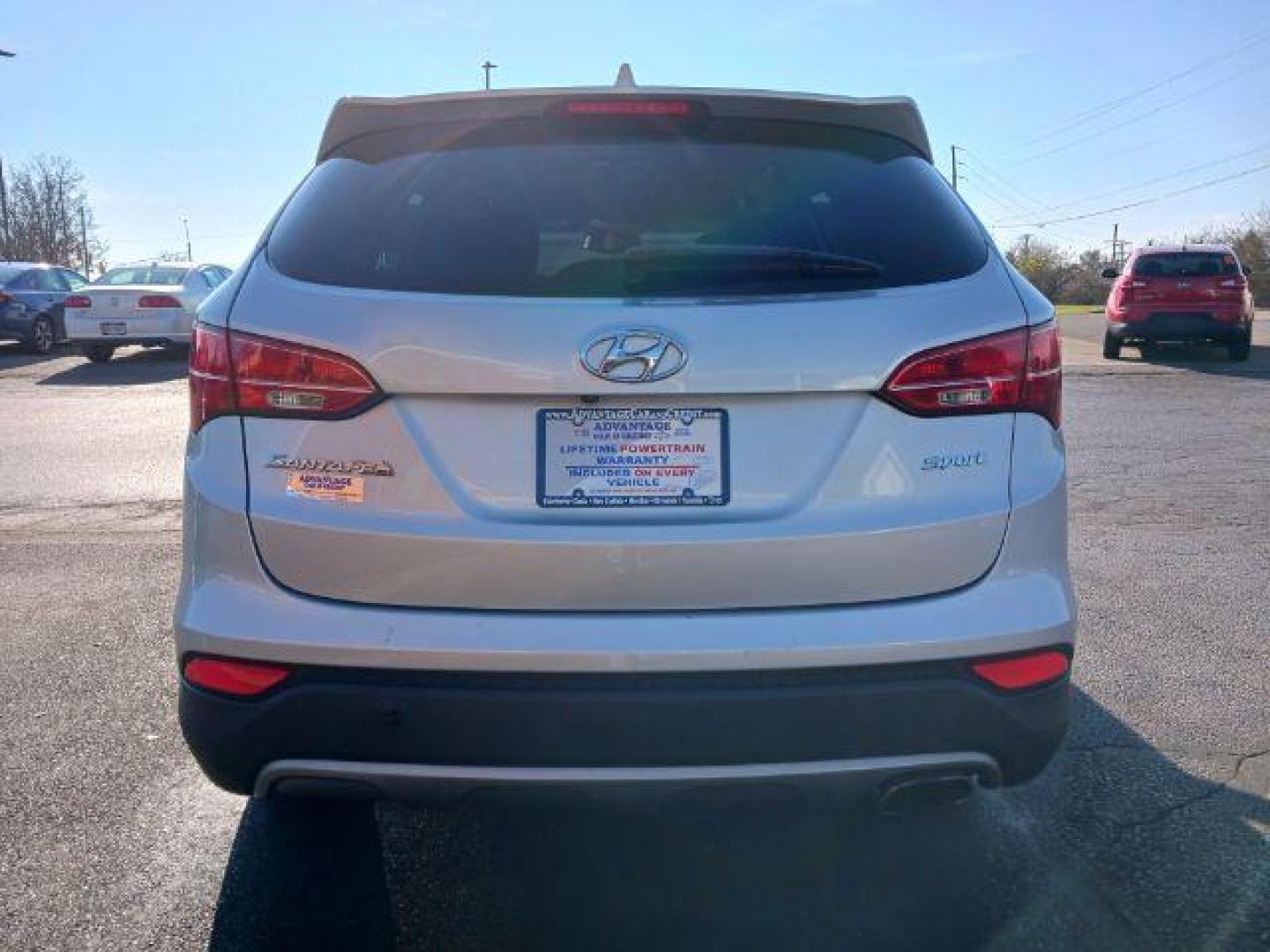 2014 Hyundai Santa Fe Sport 2.4 FWD (5XYZU3LB3EG) with an 2.4L L4 DOHC 16V engine, 6-Speed Automatic transmission, located at 1951 S Dayton Lakeview Rd., New Carlisle, OH, 45344, (937) 908-9800, 39.890999, -84.050255 - 2014 Hyundai Santa Fe Sport 2.4 FWD - Photo#5