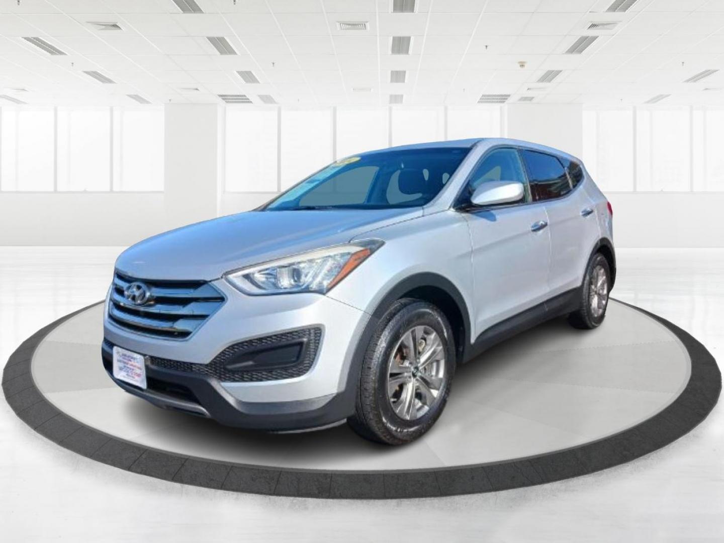 2014 Hyundai Santa Fe Sport 2.4 FWD (5XYZT3LB5EG) with an 2.4L L4 DOHC 16V engine, 6-Speed Automatic transmission, located at 880 E. National Road, Vandalia, OH, 45377, (937) 908-9800, 39.891918, -84.183594 - 2014 Hyundai Santa Fe Sport 2.4 FWD - Photo#4