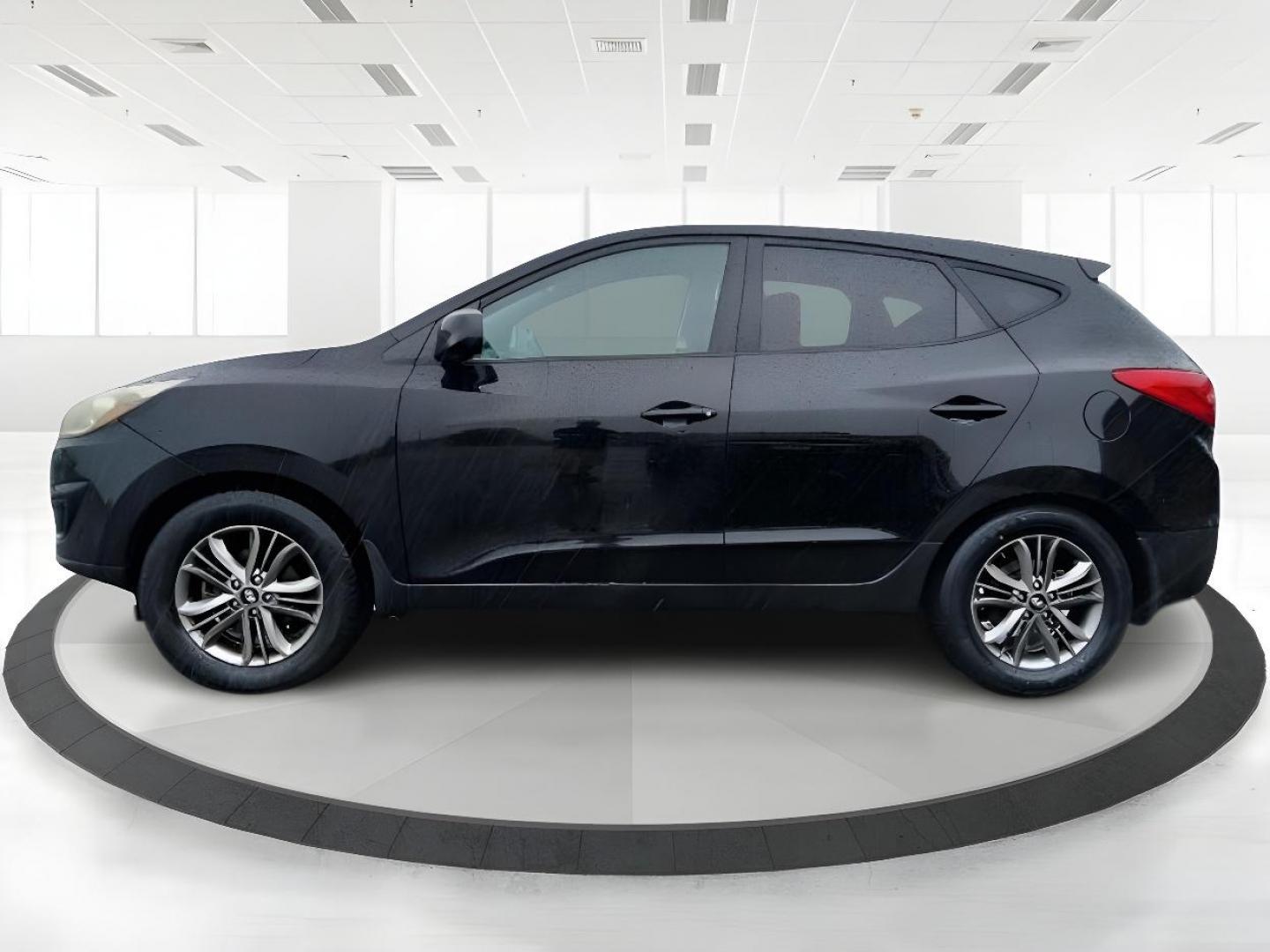 2014 Black Hyundai Tucson GL Auto AWD (KM8JTCAF0EU) with an 2.0L L4 DOHC 16V engine, 6-Speed Automatic transmission, located at 880 E. National Road, Vandalia, OH, 45377, (937) 908-9800, 39.892189, -84.181015 - Photo#3