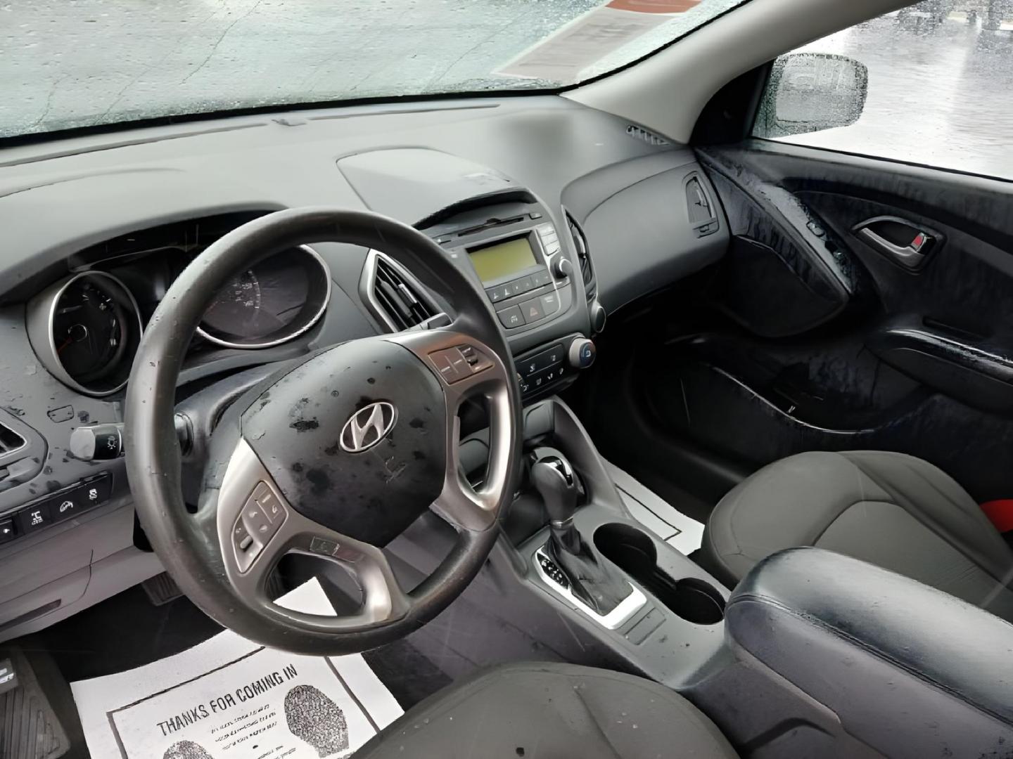 2014 Black Hyundai Tucson GL Auto AWD (KM8JTCAF0EU) with an 2.0L L4 DOHC 16V engine, 6-Speed Automatic transmission, located at 880 E. National Road, Vandalia, OH, 45377, (937) 908-9800, 39.892189, -84.181015 - Photo#6