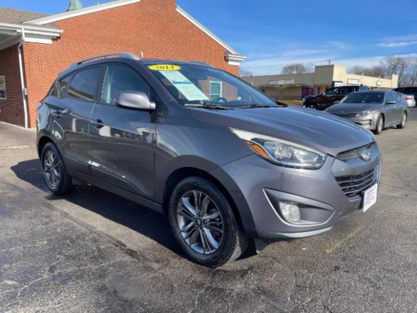 2014 Shadow Grey Hyundai Tucson GLS 2WD (KM8JU3AG9EU) with an 2.4L L4 DOHC 16V engine, 6-Speed Automatic transmission, located at 880 E. National Road, Vandalia, OH, 45377, (937) 908-9800, 39.892189, -84.181015 - Photo#0