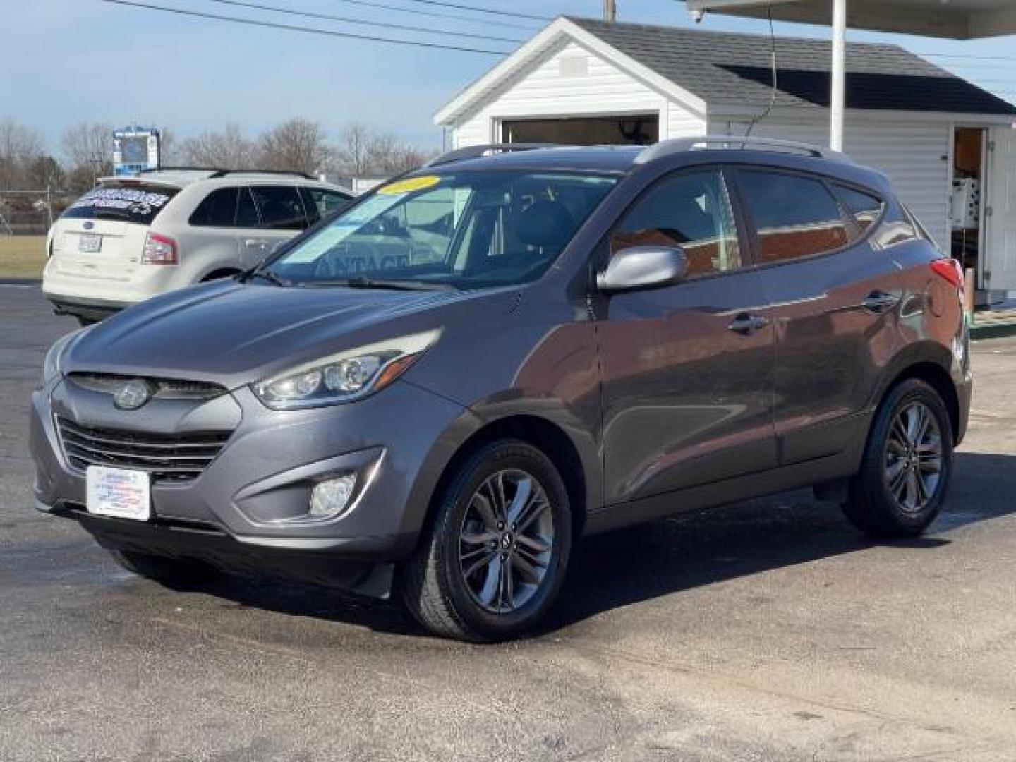 2014 Shadow Grey Hyundai Tucson GLS 2WD (KM8JU3AG9EU) with an 2.4L L4 DOHC 16V engine, 6-Speed Automatic transmission, located at 880 E. National Road, Vandalia, OH, 45377, (937) 908-9800, 39.892189, -84.181015 - Photo#1