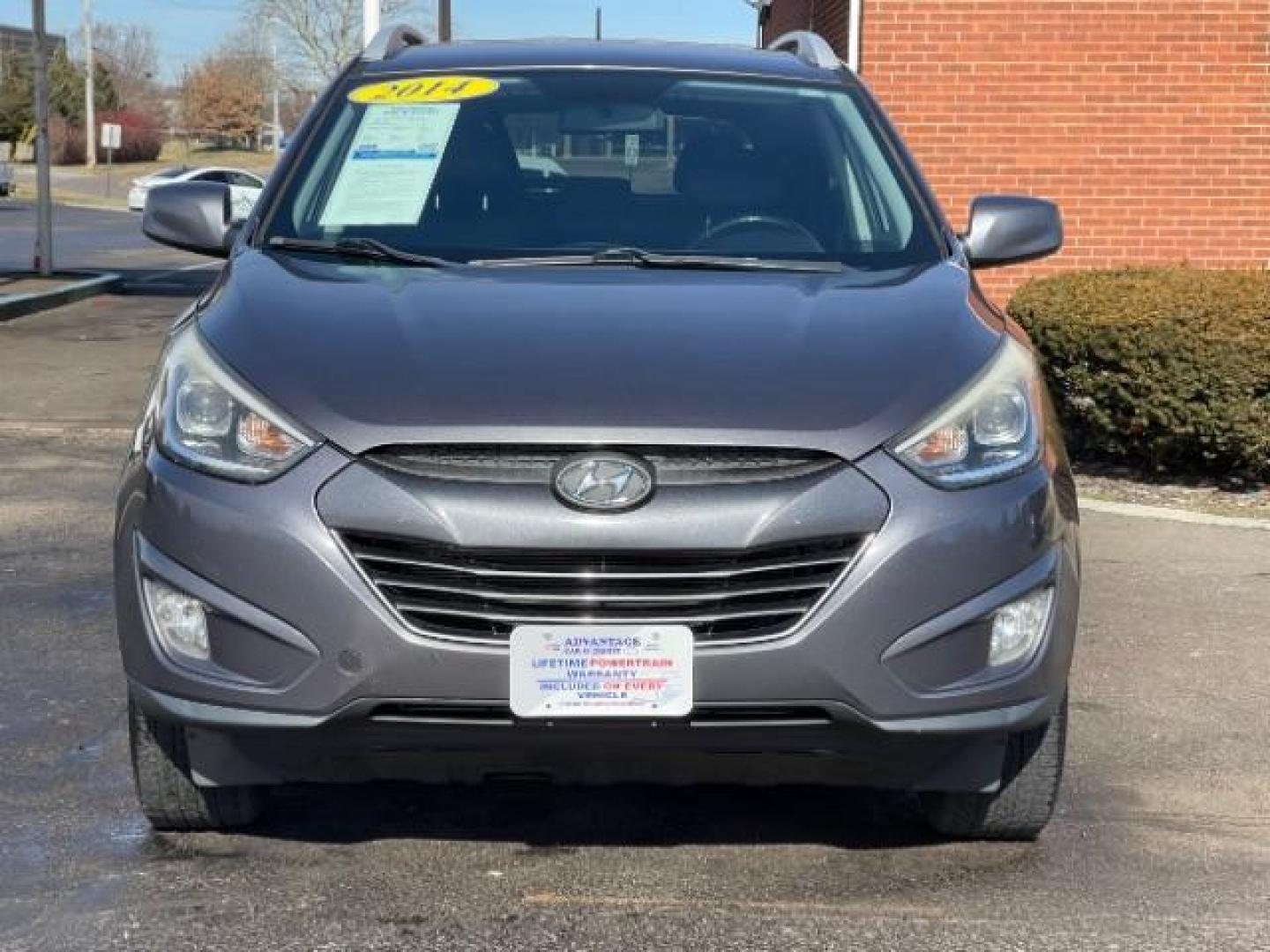 2014 Shadow Grey Hyundai Tucson GLS 2WD (KM8JU3AG9EU) with an 2.4L L4 DOHC 16V engine, 6-Speed Automatic transmission, located at 880 E. National Road, Vandalia, OH, 45377, (937) 908-9800, 39.892189, -84.181015 - Photo#2