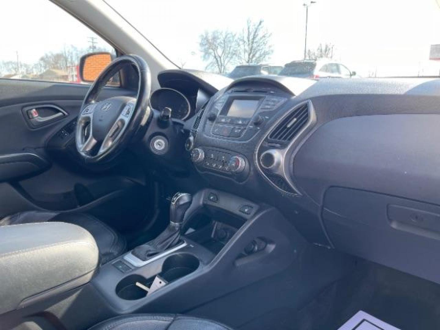 2014 Shadow Grey Hyundai Tucson GLS 2WD (KM8JU3AG9EU) with an 2.4L L4 DOHC 16V engine, 6-Speed Automatic transmission, located at 880 E. National Road, Vandalia, OH, 45377, (937) 908-9800, 39.892189, -84.181015 - Photo#7