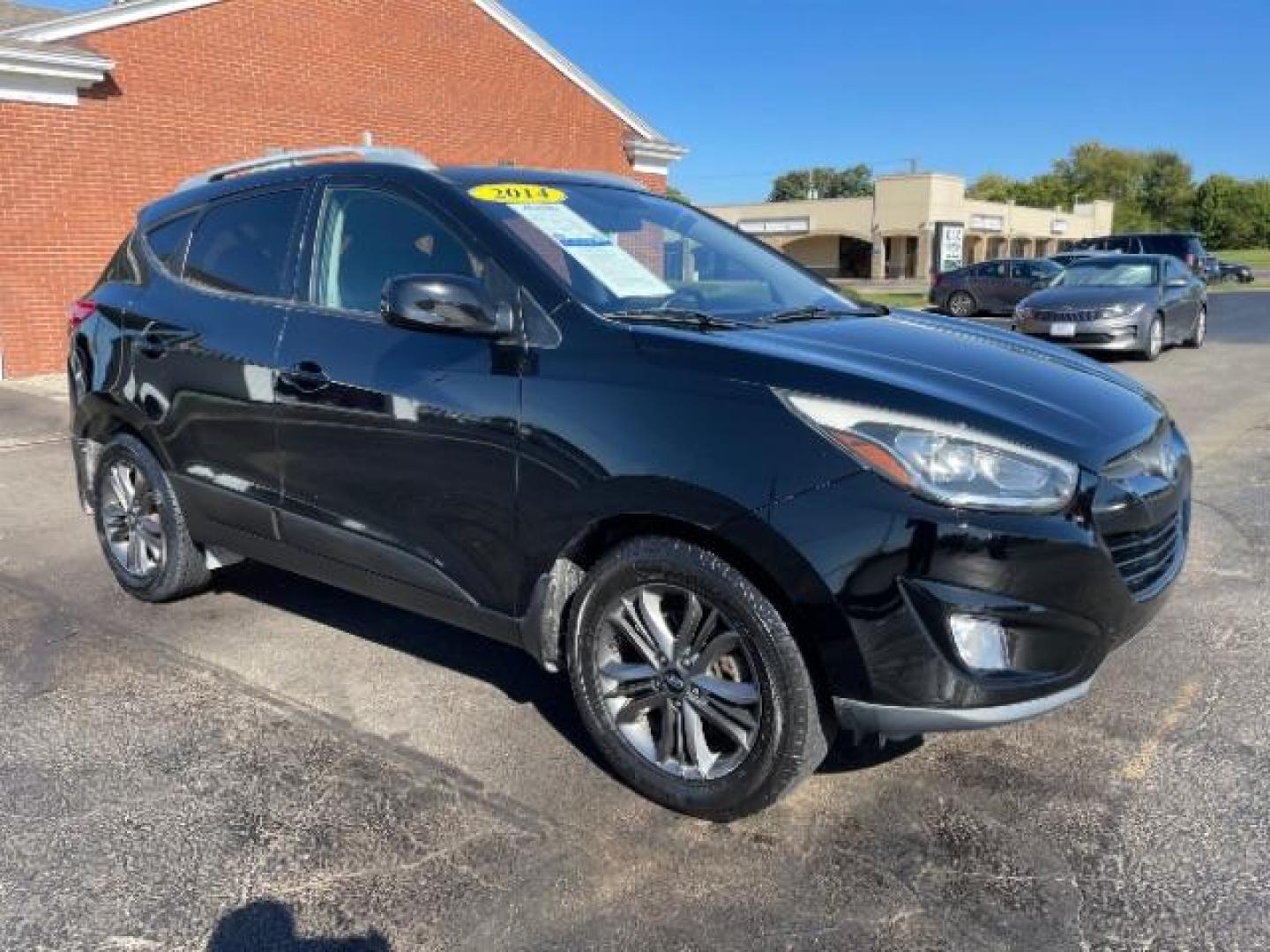 2014 Ash Black Hyundai Tucson GLS 2WD (KM8JU3AG6EU) with an 2.4L L4 DOHC 16V engine, 6-Speed Automatic transmission, located at 1099 N County Rd 25A, OH, 45373, (937) 908-9800, 40.057079, -84.212883 - Photo#0