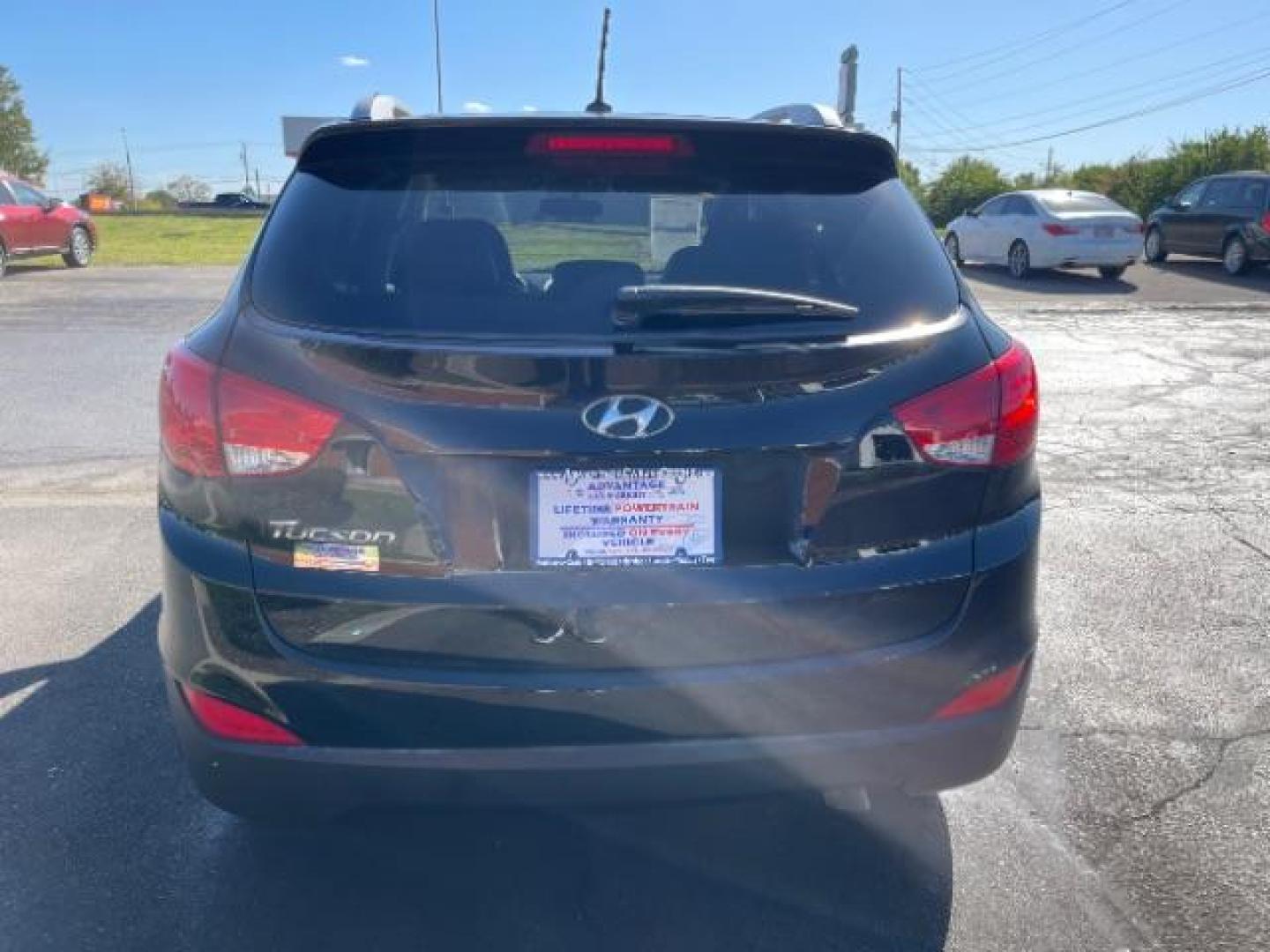 2014 Ash Black Hyundai Tucson GLS 2WD (KM8JU3AG6EU) with an 2.4L L4 DOHC 16V engine, 6-Speed Automatic transmission, located at 1099 N County Rd 25A, OH, 45373, (937) 908-9800, 40.057079, -84.212883 - Photo#3