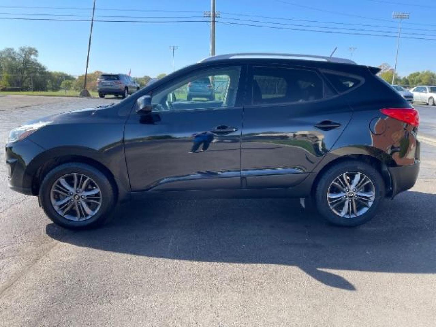 2014 Ash Black Hyundai Tucson GLS 2WD (KM8JU3AG6EU) with an 2.4L L4 DOHC 16V engine, 6-Speed Automatic transmission, located at 1099 N County Rd 25A, OH, 45373, (937) 908-9800, 40.057079, -84.212883 - Photo#4