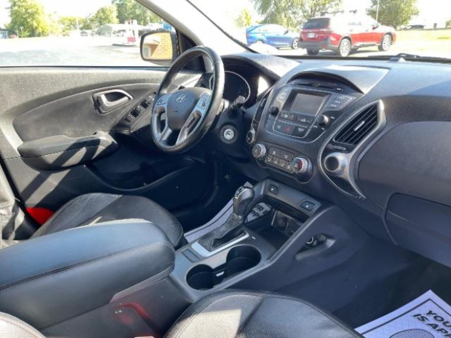 2014 Ash Black Hyundai Tucson GLS 2WD (KM8JU3AG6EU) with an 2.4L L4 DOHC 16V engine, 6-Speed Automatic transmission, located at 1099 N County Rd 25A, OH, 45373, (937) 908-9800, 40.057079, -84.212883 - Photo#8