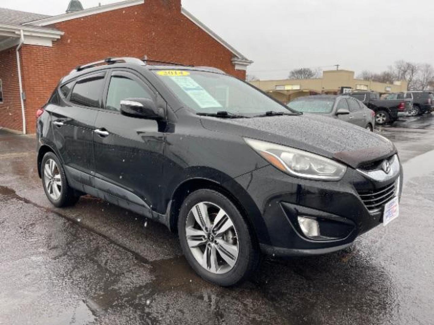 2014 Ash Black Hyundai Tucson GLS AWD (KM8JUCAG3EU) with an 2.4L L4 DOHC 16V engine, 6-Speed Automatic transmission, located at 1184 Kauffman Ave, Fairborn, OH, 45324, (937) 908-9800, 39.807365, -84.029114 - Photo#0