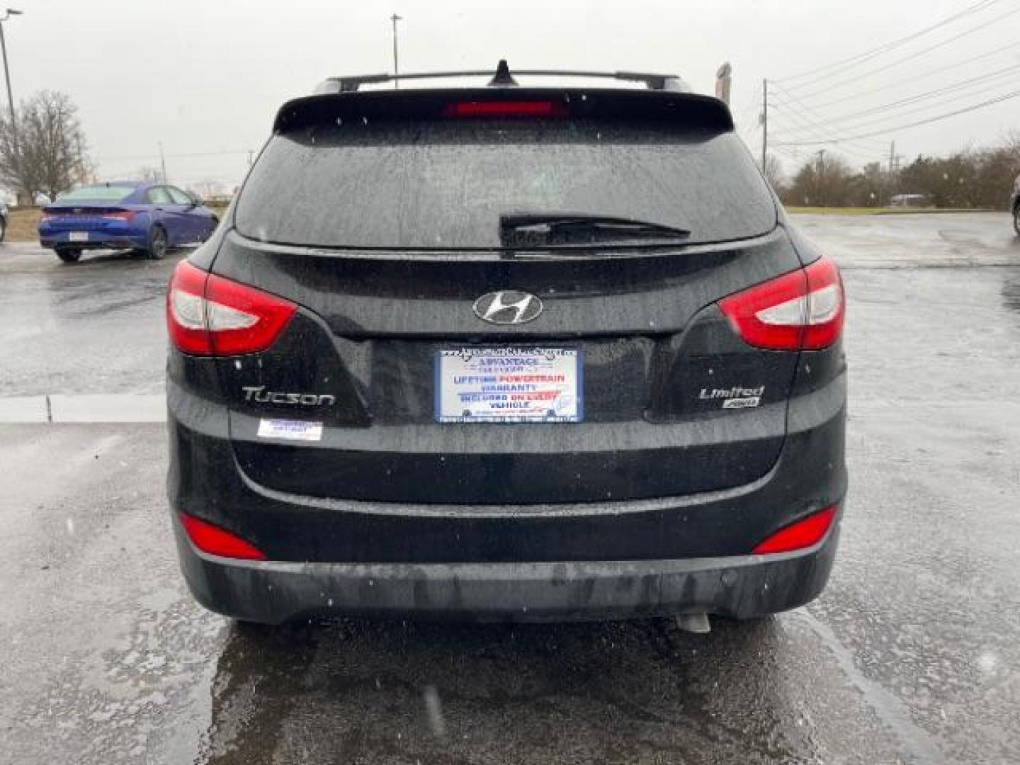 2014 Ash Black Hyundai Tucson GLS AWD (KM8JUCAG3EU) with an 2.4L L4 DOHC 16V engine, 6-Speed Automatic transmission, located at 1184 Kauffman Ave, Fairborn, OH, 45324, (937) 908-9800, 39.807365, -84.029114 - Photo#4