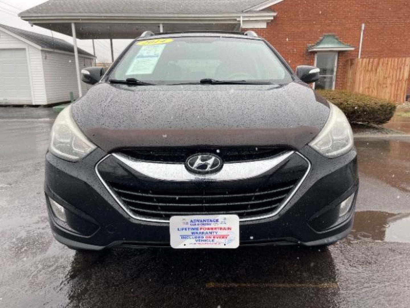 2014 Ash Black Hyundai Tucson GLS AWD (KM8JUCAG3EU) with an 2.4L L4 DOHC 16V engine, 6-Speed Automatic transmission, located at 1184 Kauffman Ave, Fairborn, OH, 45324, (937) 908-9800, 39.807365, -84.029114 - Photo#5