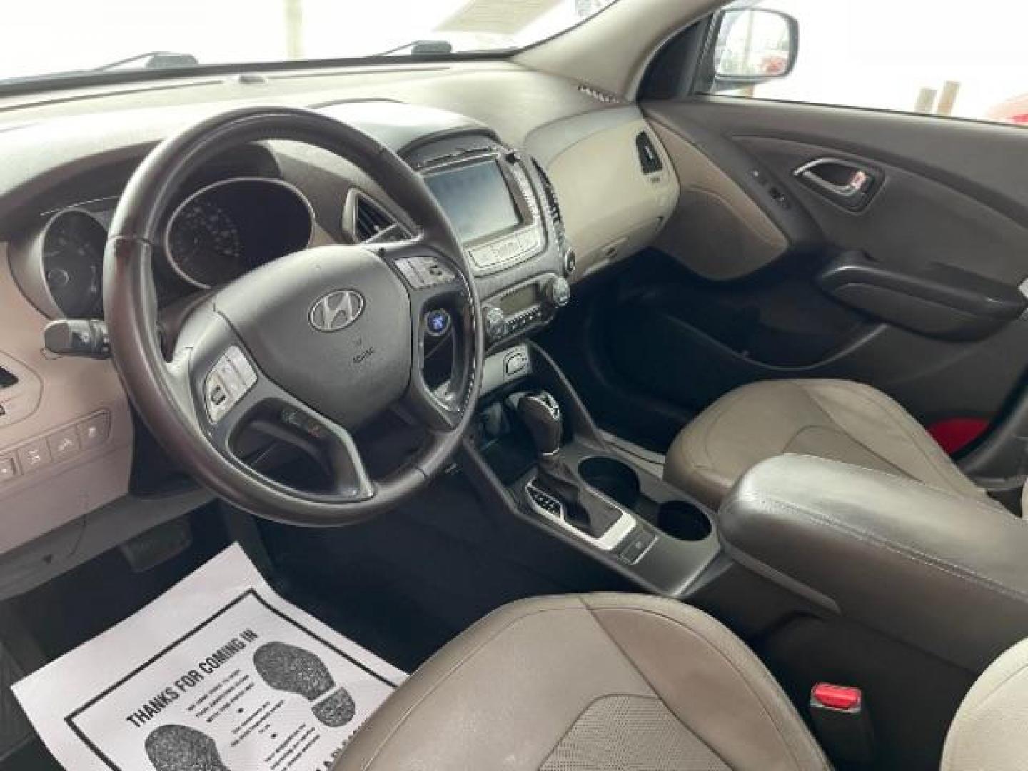 2014 Ash Black Hyundai Tucson GLS AWD (KM8JUCAG3EU) with an 2.4L L4 DOHC 16V engine, 6-Speed Automatic transmission, located at 1184 Kauffman Ave, Fairborn, OH, 45324, (937) 908-9800, 39.807365, -84.029114 - Photo#6