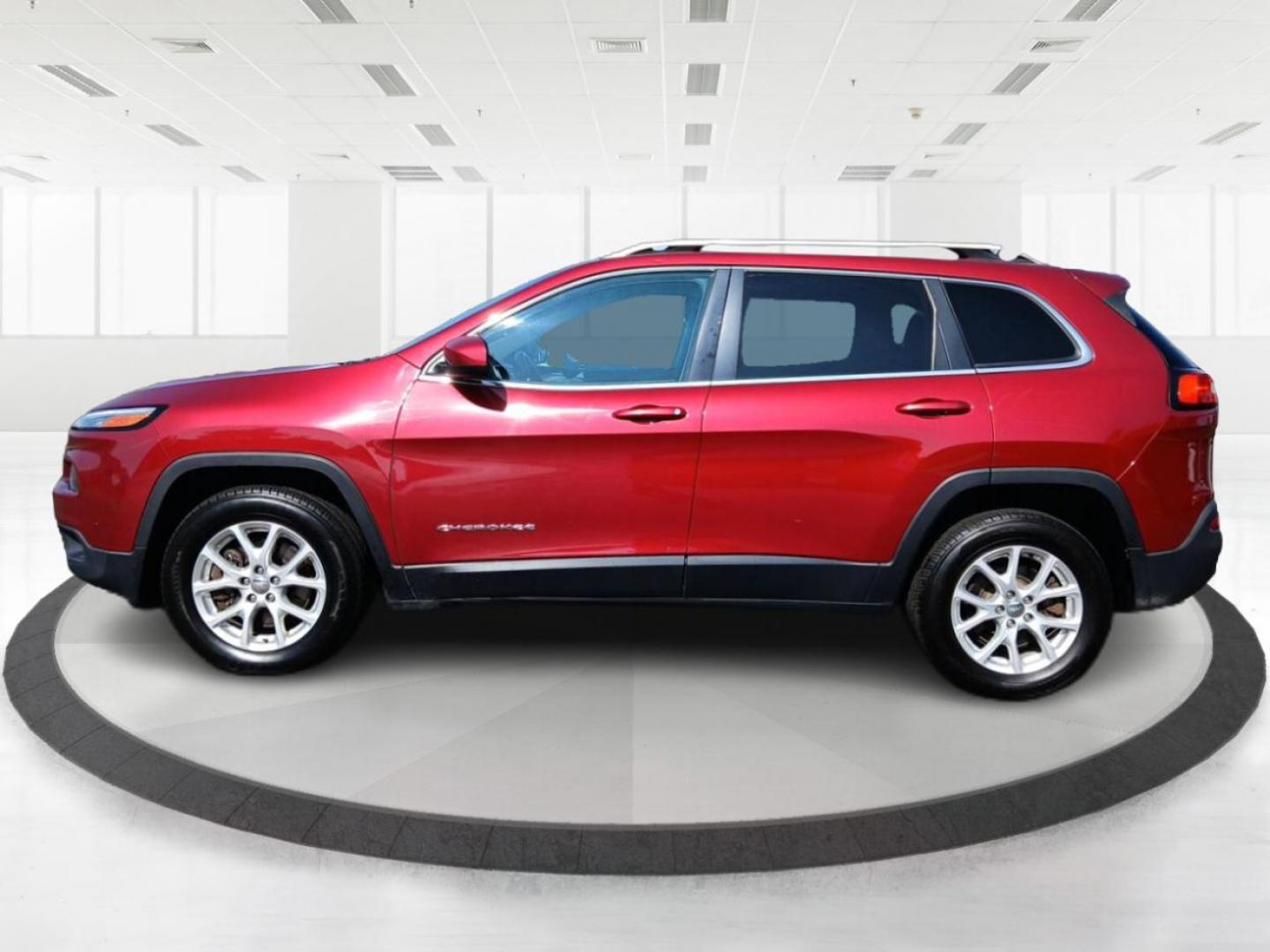 2014 Dp Cherry Red Crystal PC Jeep Cherokee (1C4PJMCS0EW) with an 3.2L V6 DOHC 24V engine, 9-Speed Automatic transmission, located at 1099 N County Rd 25A, OH, 45373, (937) 908-9800, 40.057079, -84.212883 - Photo#5