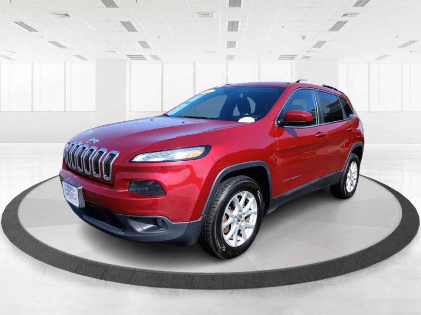 2014 Dp Cherry Red Crystal PC Jeep Cherokee (1C4PJMCS0EW) with an 3.2L V6 DOHC 24V engine, 9-Speed Automatic transmission, located at 1099 N County Rd 25A, OH, 45373, (937) 908-9800, 40.057079, -84.212883 - Photo#7