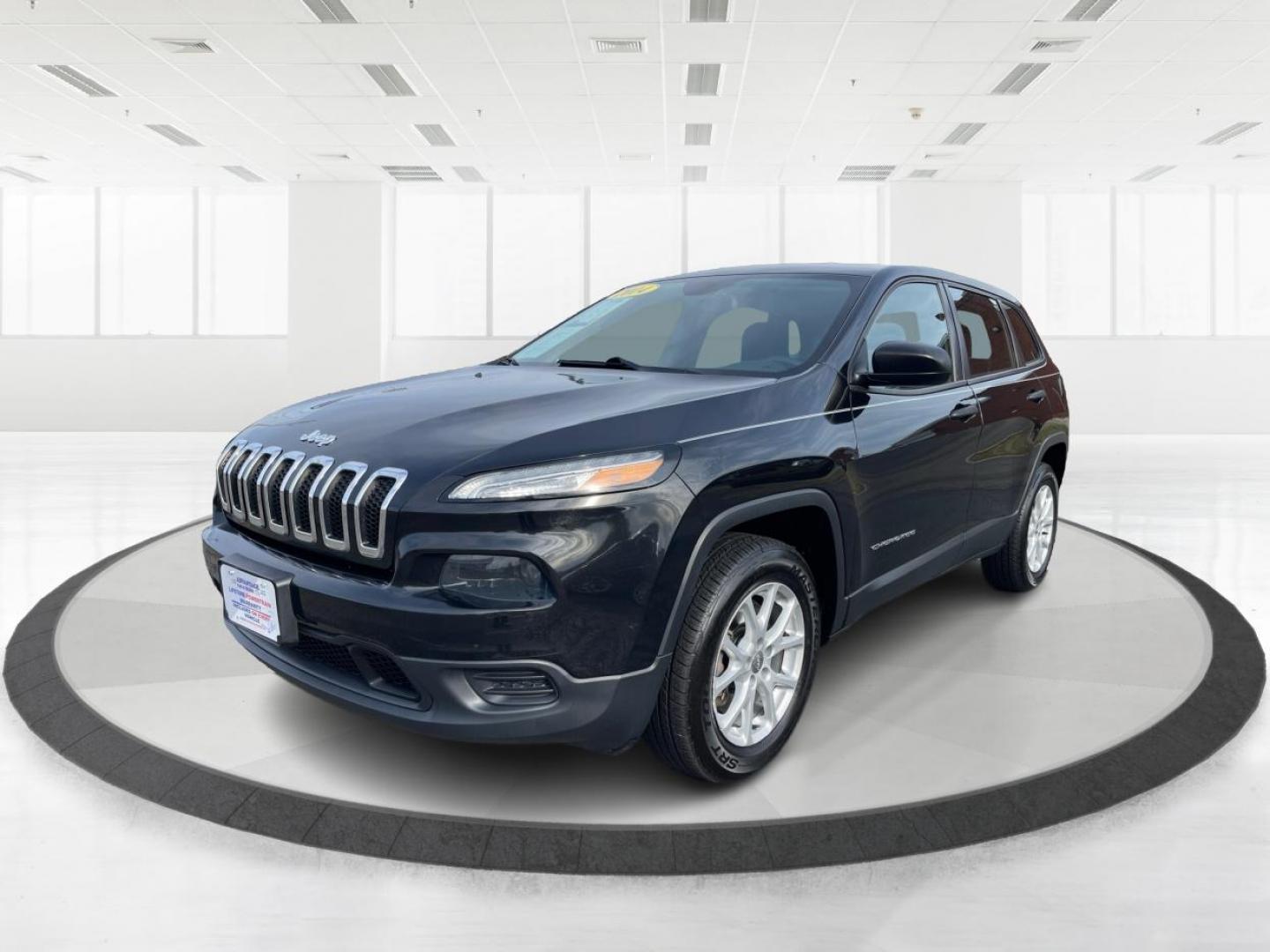 2014 Brilliant Black Crystal P Jeep Cherokee Sport 4WD (1C4PJMAB8EW) with an 2.4L L4 DOHC 16V engine, 9-Speed Automatic transmission, located at 401 Woodman Dr, Riverside, OH, 45431, (937) 908-9800, 39.763779, -84.122063 - Photo#7