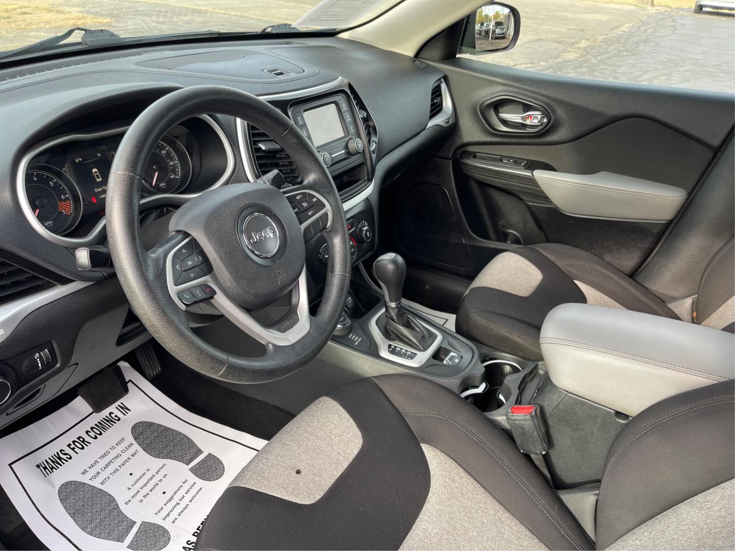 2014 Brilliant Black Crystal P Jeep Cherokee Sport 4WD (1C4PJMAB8EW) with an 2.4L L4 DOHC 16V engine, 9-Speed Automatic transmission, located at 401 Woodman Dr, Riverside, OH, 45431, (937) 908-9800, 39.763779, -84.122063 - Photo#8